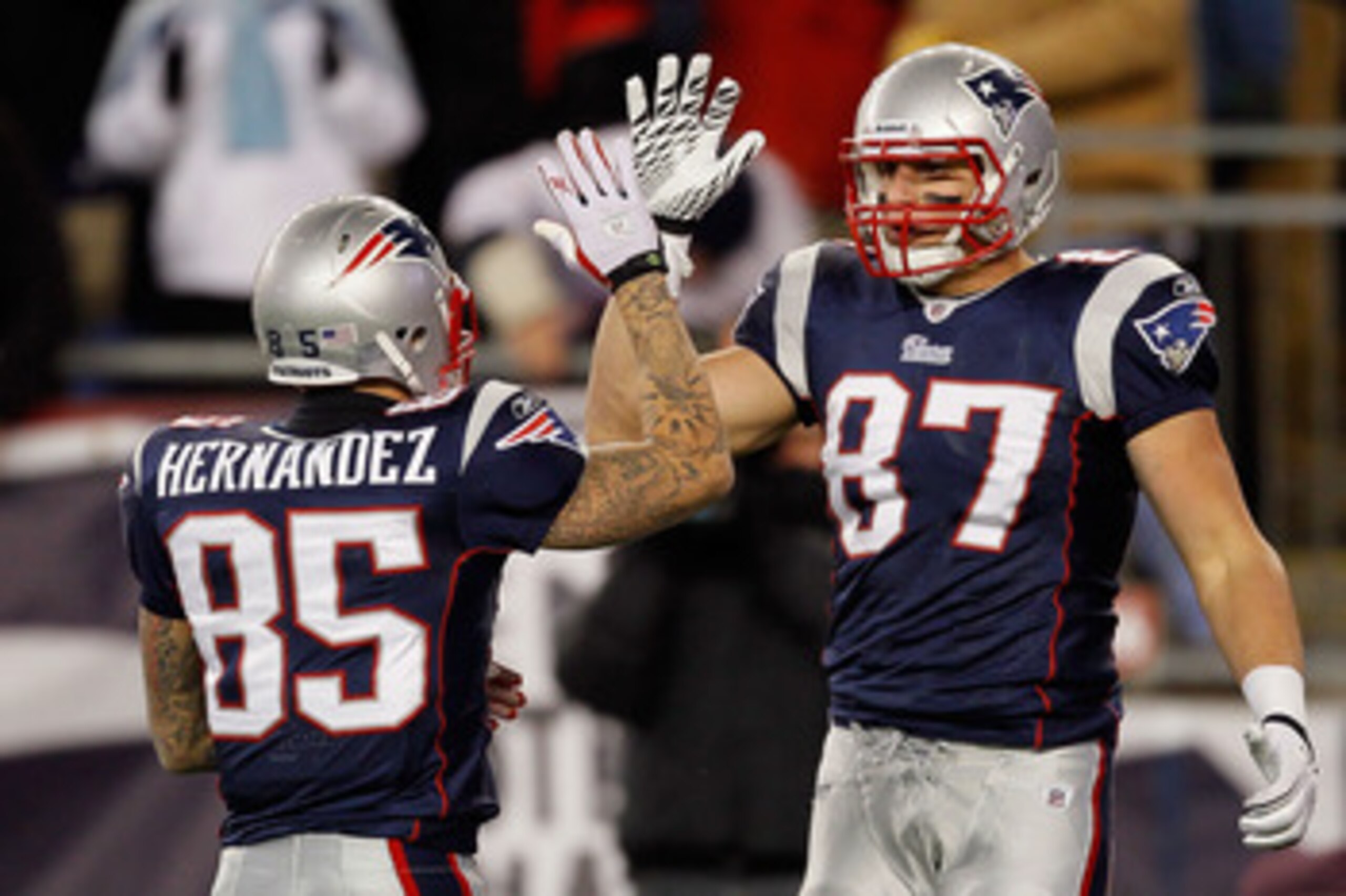 FOXBORO, MA - DECEMBER 06:  (L-R) Aaron Hernandez #85 and Rob Gronkowski #87 of the New England Patriots celebrate a play against the New York Jets at Gillette Stadium on December 6, 2010 in Foxboro, Massachusetts. The Patriots won 45-3. (Photo by Jim Rog