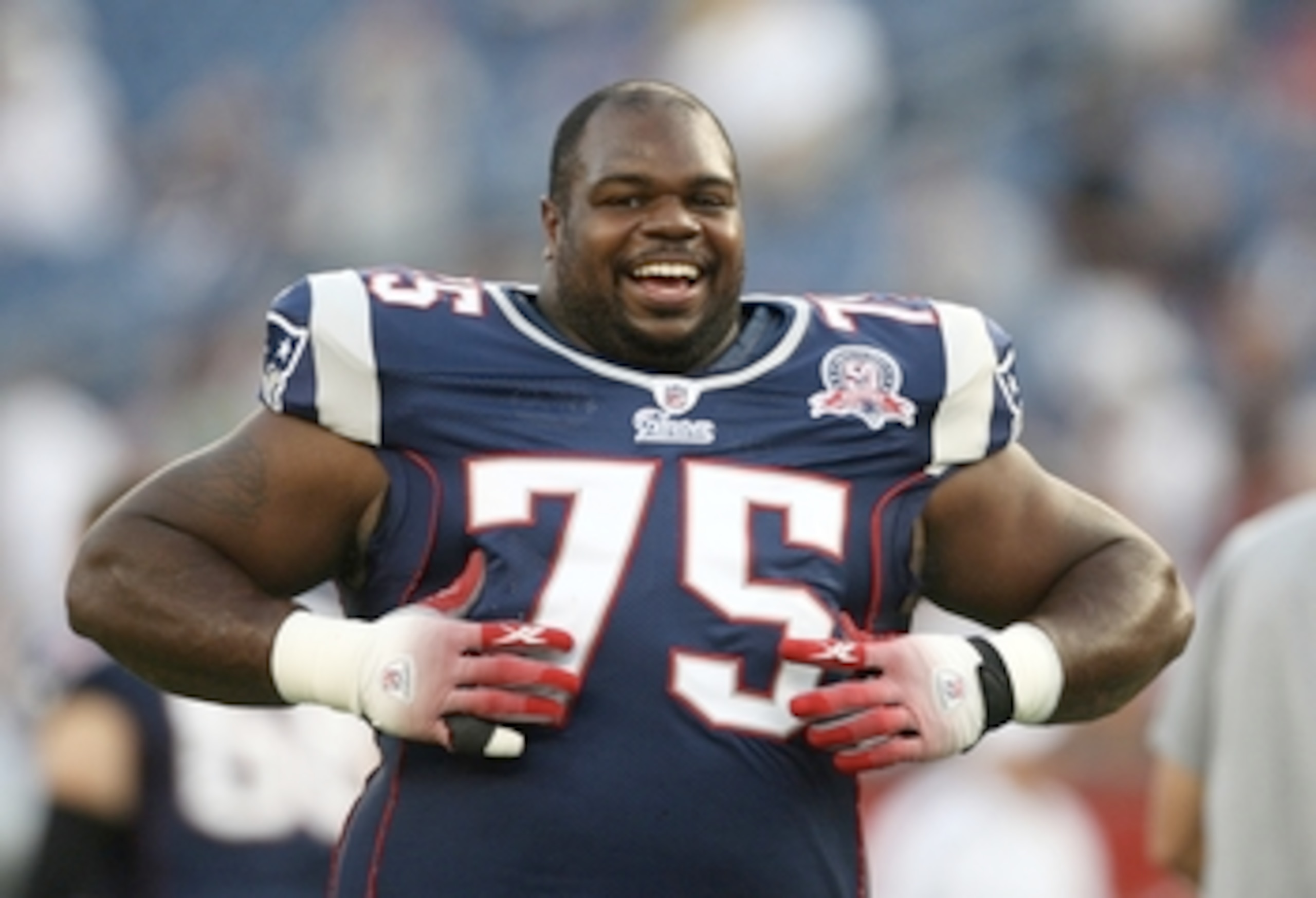 FOXBORO, MA - AUGUST 20:  Vince Wilfork #75 of the New England Patriots smiles during warm ups gainst the Cincinnati Bengals during their preseason game at Gillette Stadium on August 20, 2009 in Foxboro, Massachusetts.  (Photo by Jim Rogash/Getty Images)