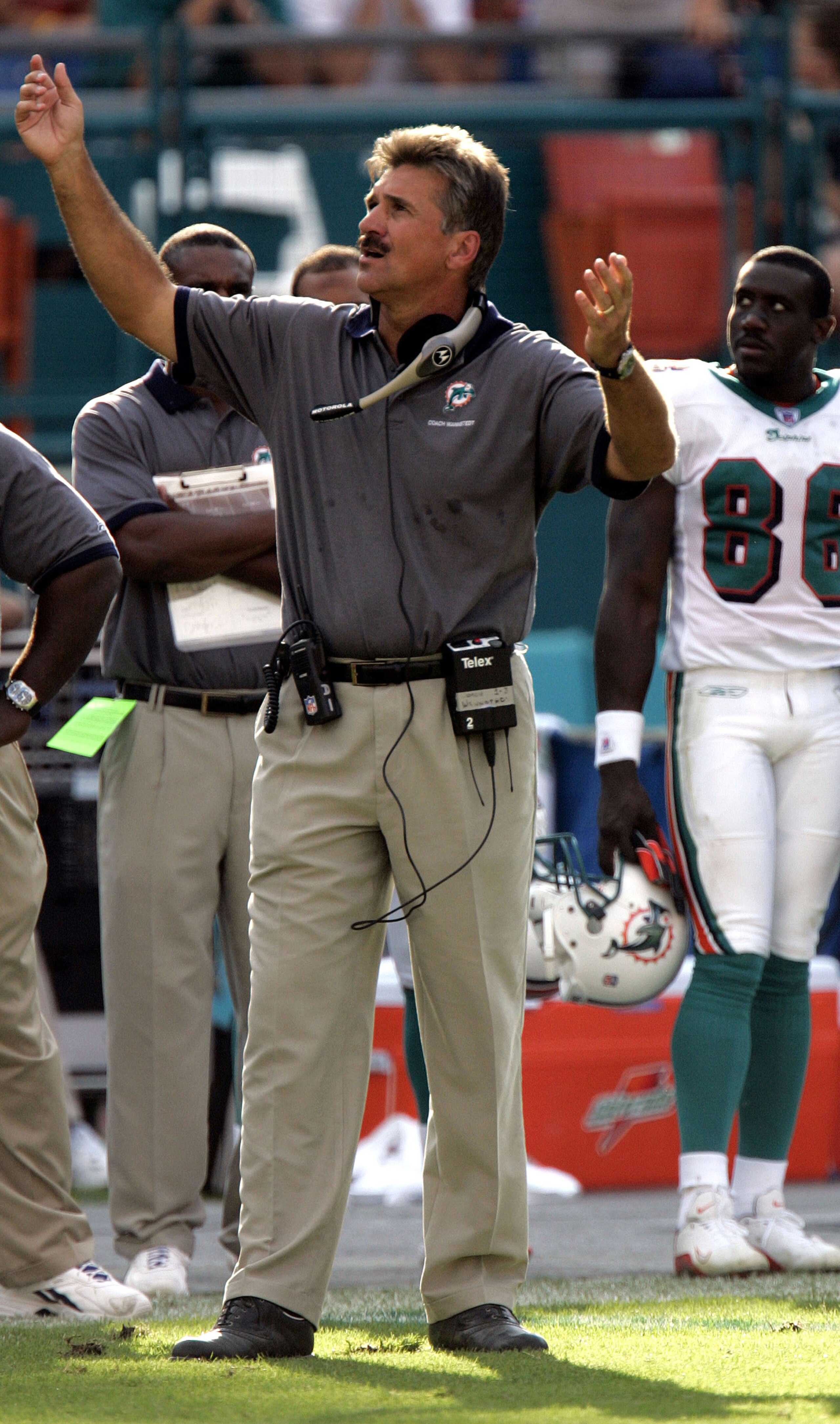 MIAMI - NOVEMBER 7:  Head Coach Dave Wannstedt of the Miami Dolphins looks up at the replay against the Arizona Cardinals in the fourth quarter at Pro Player Stadium on November 7, 2004 in Miami, Florida.  The Cardinals defeated the Dolphins 24-23.  (Phot