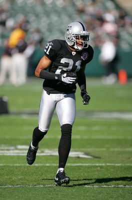 OAKLAND, CA - NOVEMBER 15:  Nnamdi Asomugha #21 of the Oakland Raiders warms up before their game against the Kansas City Chiefs at Oakland-Alameda County Coliseum on November 15, 2009 in Oakland, California.  (Photo by Ezra Shaw/Getty Images)