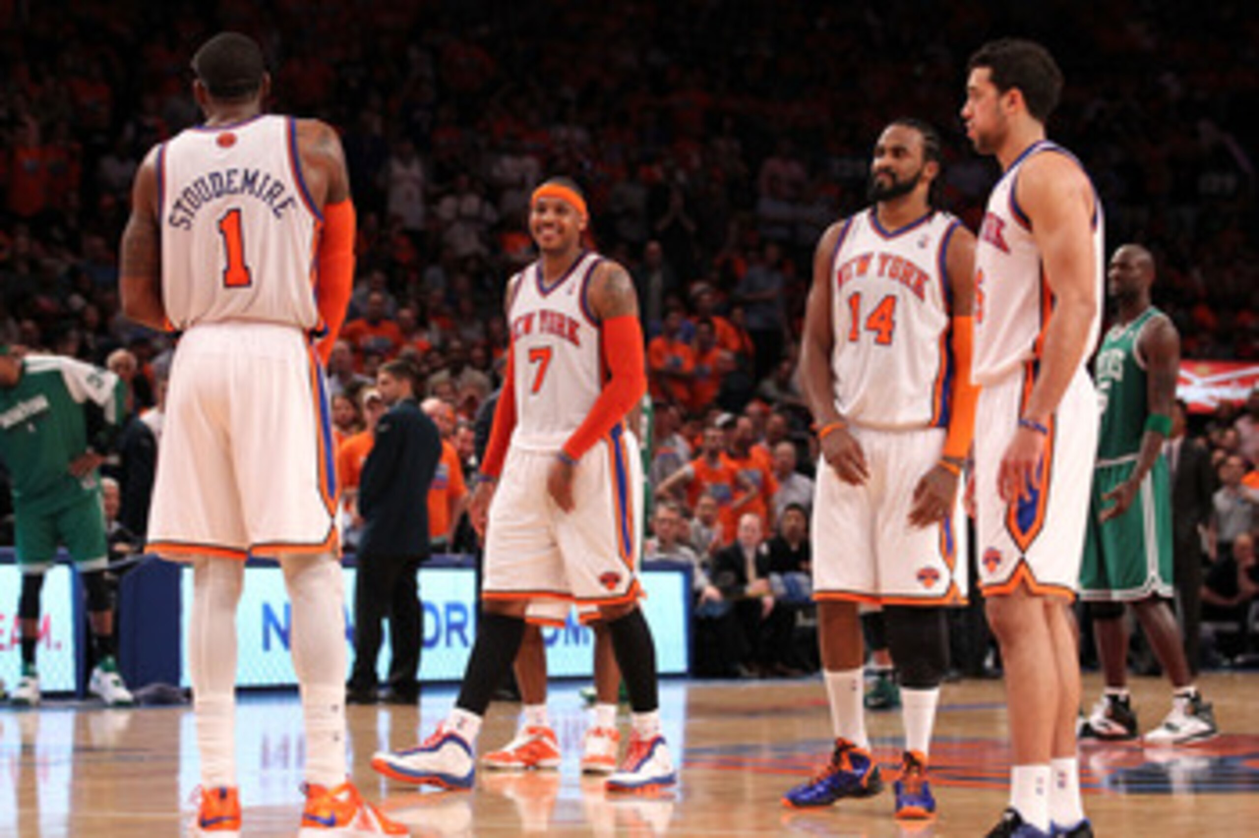 NEW YORK, NY - APRIL 24:  (L-R) Amar'e Stoudemire #1, Carmelo Anthony #7, Ronny Turiaf #14 and Landry Fields #6 of the New York Knicks look on against the Boston Celtics in Game Four of the Eastern Conference Quarterfinals during the 2011 NBA Playoffs on 