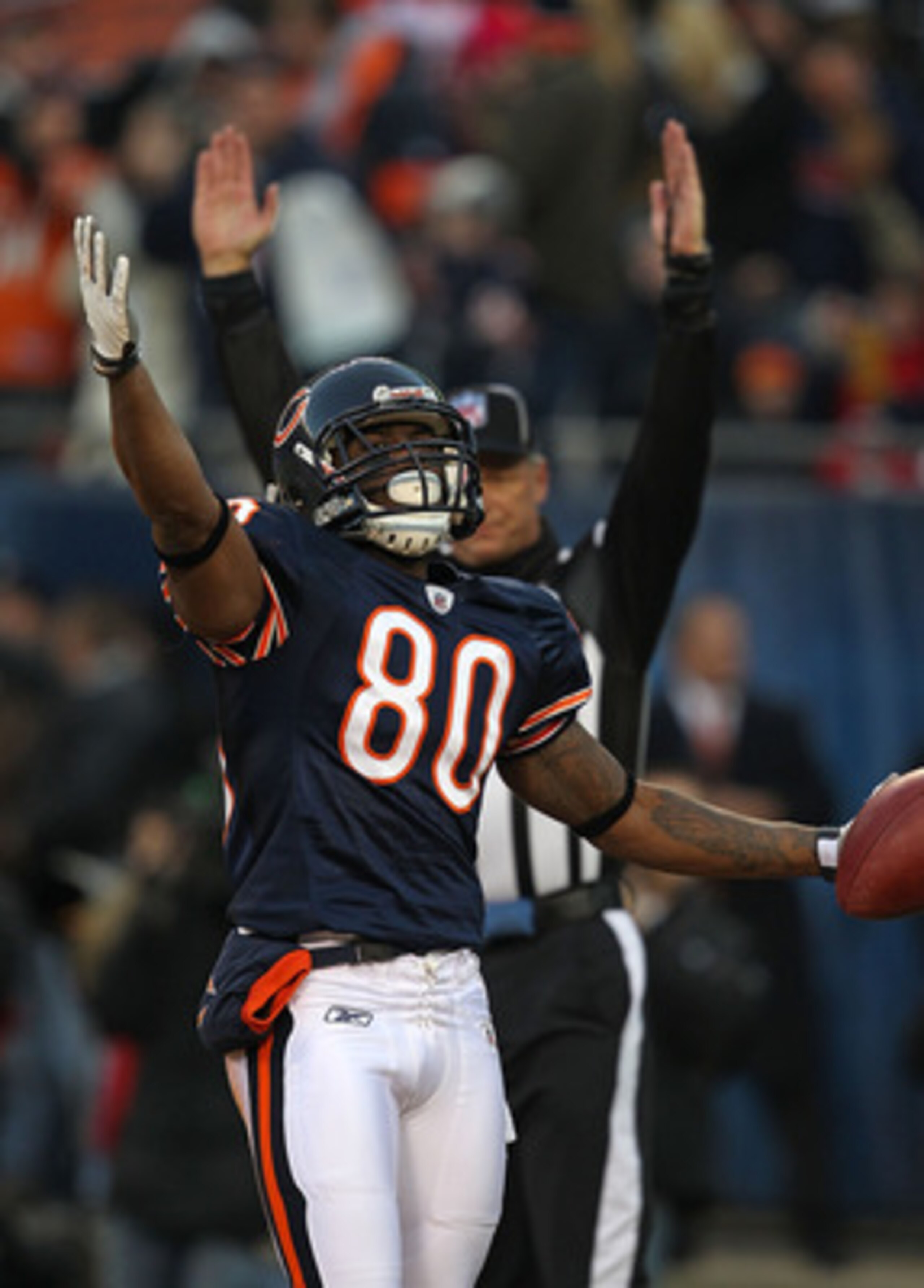 CHICAGO - NOVEMBER 28: Earl Bennett #80 of the Chicago Bears celebrates a touchdown catch against the Philadelphia Eagles at Soldier Field on November 28, 2010 in Chicago, Illinois. The Bears defeated the Eagles 31-26. (Photo by Jonathan Daniel/Getty Imag