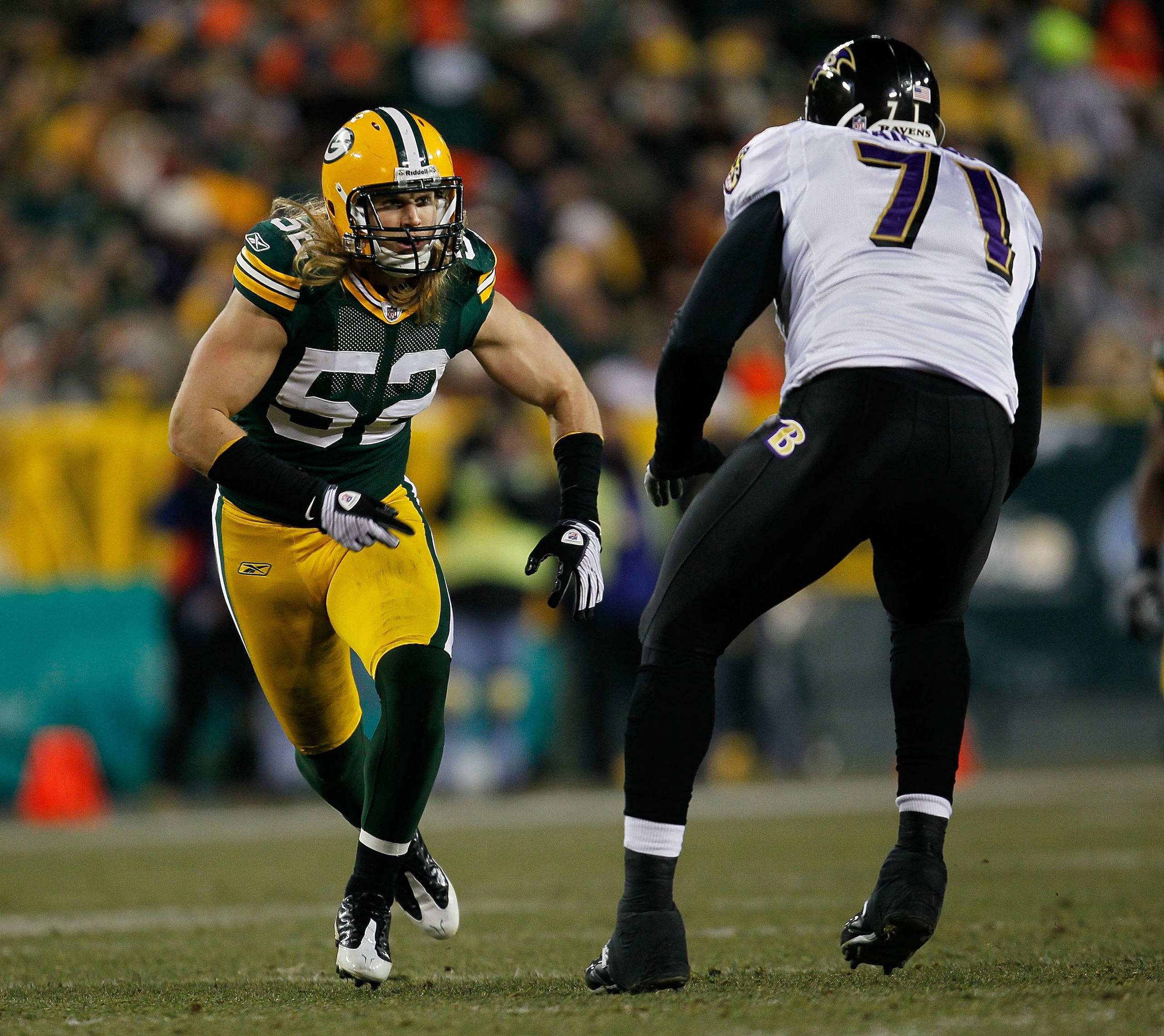 GREEN BAY, WI - DECEMBER 07: Clay Matthews #52 of the Green Bay Packers rushes against Jared Gaither #71 of the Baltimore Ravens at Lambeau Field on December 7, 2009 in Green Bay, Wisconsin. The Packers defeated the Ravens 27-17. (Photo by Jonathan Daniel GREEN BAY, WI - DECEMBER 07: Clay Matthews #52 of the Green Bay Packers rushes against Jared Gaither #71 of the Baltimore Ravens at Lambeau Field on December 7, 2009 in Green Bay, Wisconsin. The Packers defeated the Ravens 27-17. (Photo by Jonathan Daniel