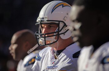 DENVER - JANUARY 02:  Quarterback Philip Rivers #17 of the San Diego Chargers takes the field against the Denver Broncos at INVESCO Field at Mile High on January 2, 2011 in Denver, Colorado. The Chargers defeated the Broncos 33-28.  (Photo by Doug Pensing