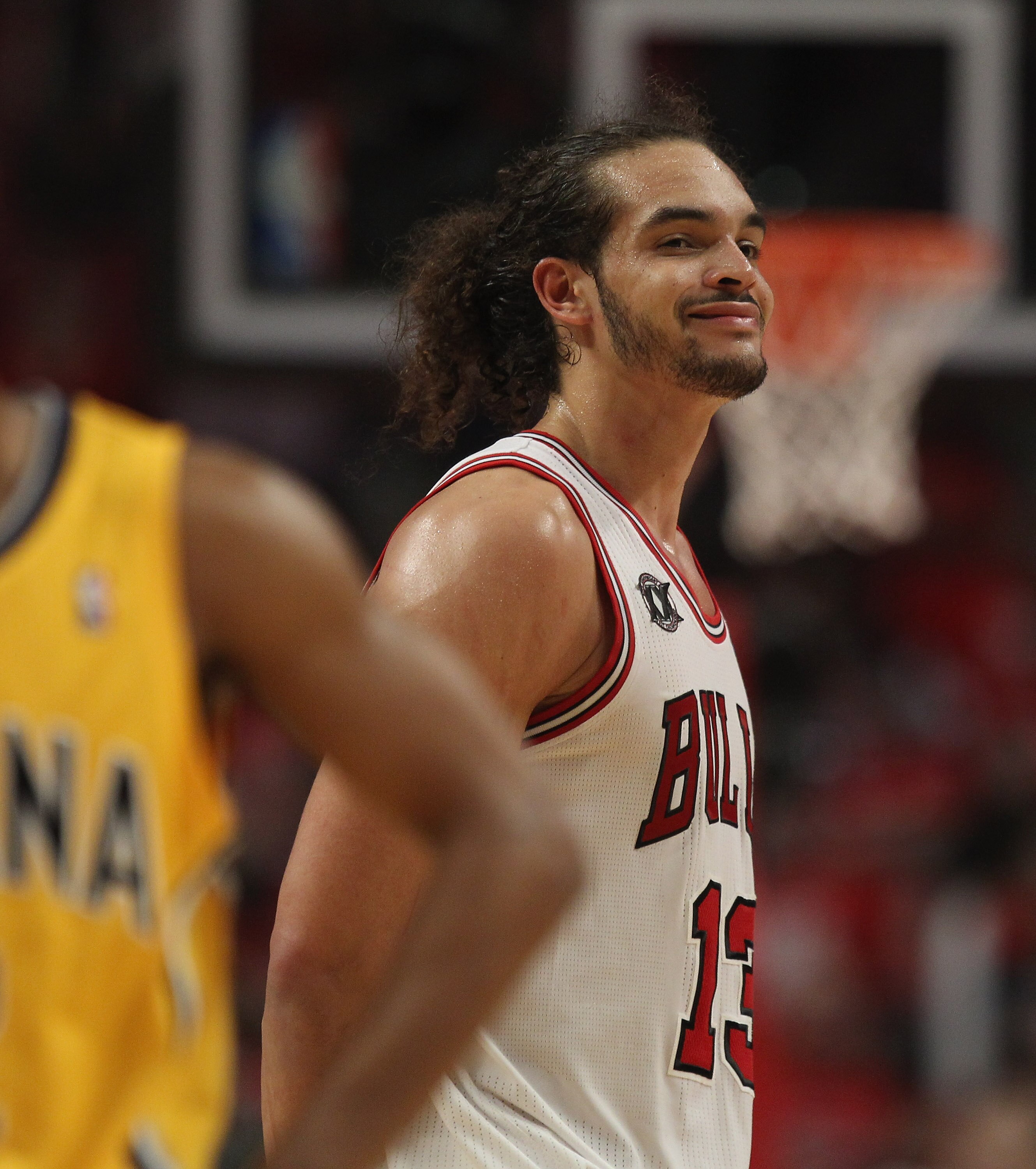 CHICAGO, IL - APRIL 26: Joakim Noah #13 of the Chicago Bulls smiles at family in the stands near the end of a win over the Indiana Pacers in Game Five of the Eastern Conference Quarterfinals in the 2011 NBA Playoffs at the United Center on April 26, 2011