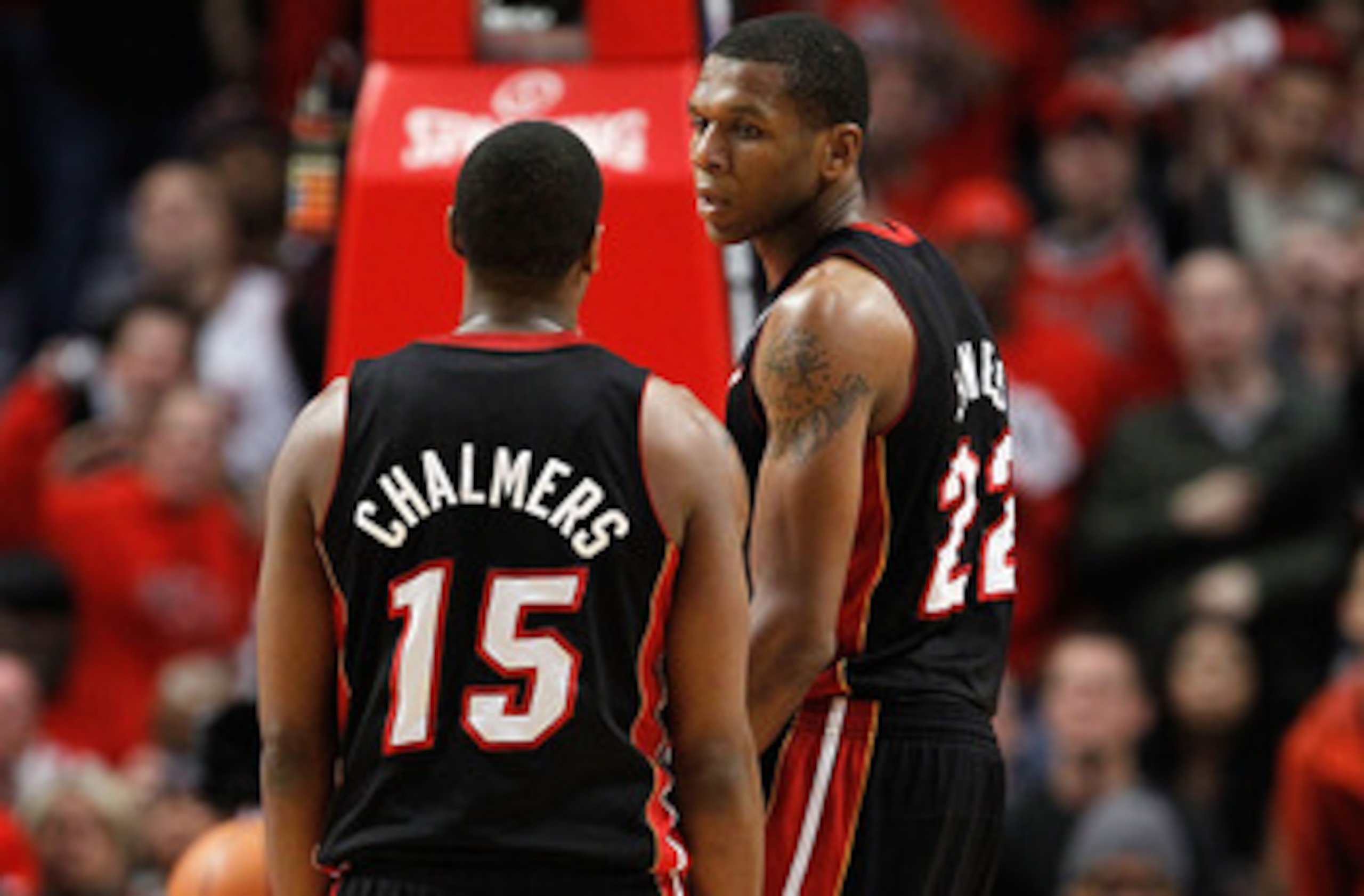 CHICAGO, IL - MAY 15: Mario Chalmers #15 and James Jones #22 of the Miami Heat talk on court against the Chicago Bulls in Game One of the Eastern Conference Finals during the 2011 NBA Playoffs on May 15, 2011 at the United Center in Chicago, Illinois. The