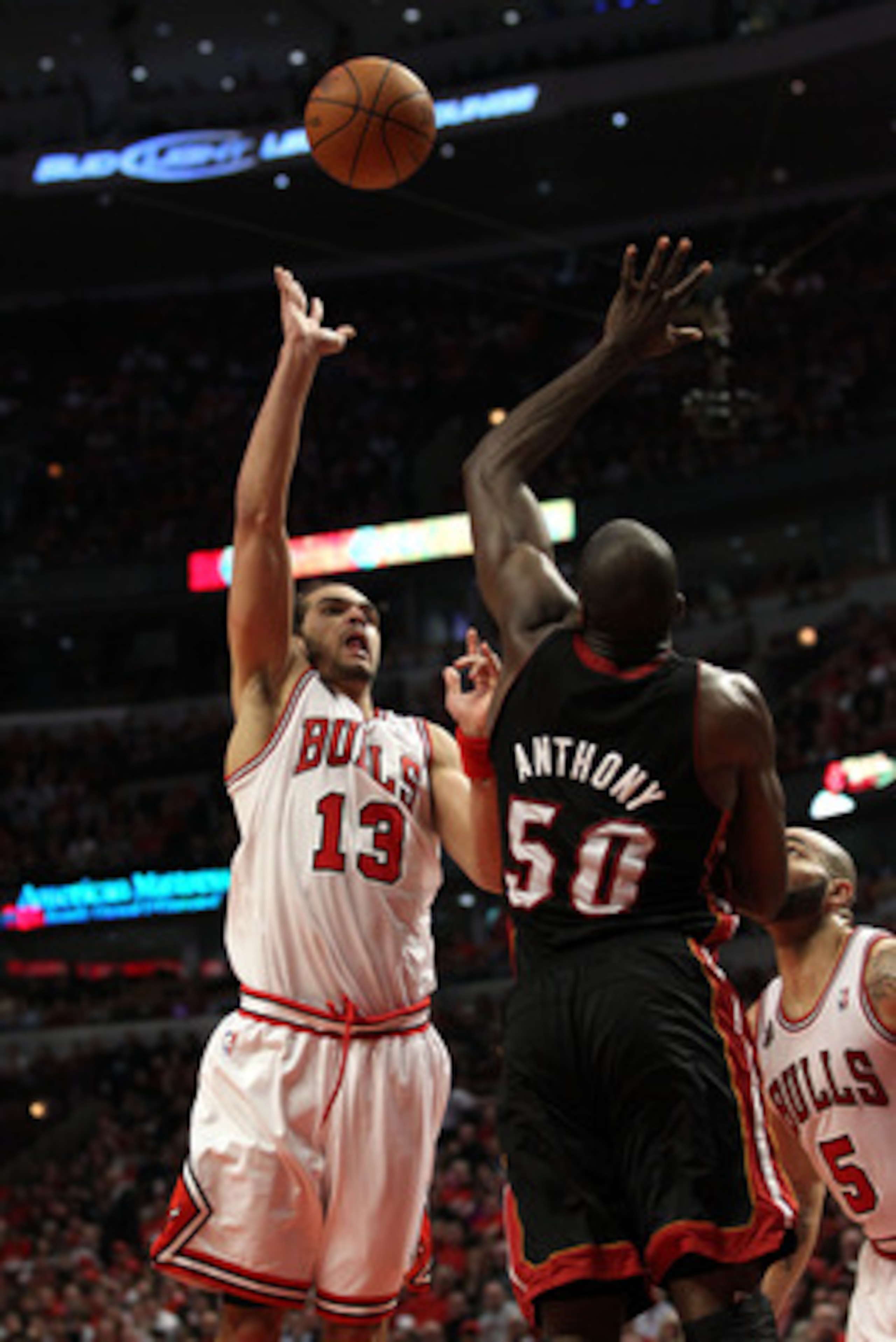 CHICAGO, IL - MAY 15: Joakim Noah #13 of the Chicago Bulls attempts a shot against Joel Anthony #50 of the Miami Heat in Game One of the Eastern Conference Finals during the 2011 NBA Playoffs on May 15, 2011 at the United Center in Chicago, Illinois. NOTE