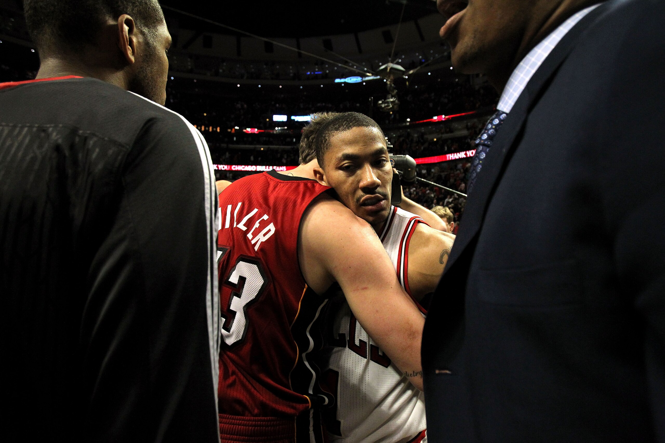 CHICAGO, IL - MAY 26:  Derrick Rose #1 of the Chicago Bulls looks on dejected as he congratulates Mike Miller #13 of the Miami Heat after the Heat won 83-80 in Game Five of the Eastern Conference Finals during the 2011 NBA Playoffs on May 26, 2011 at the