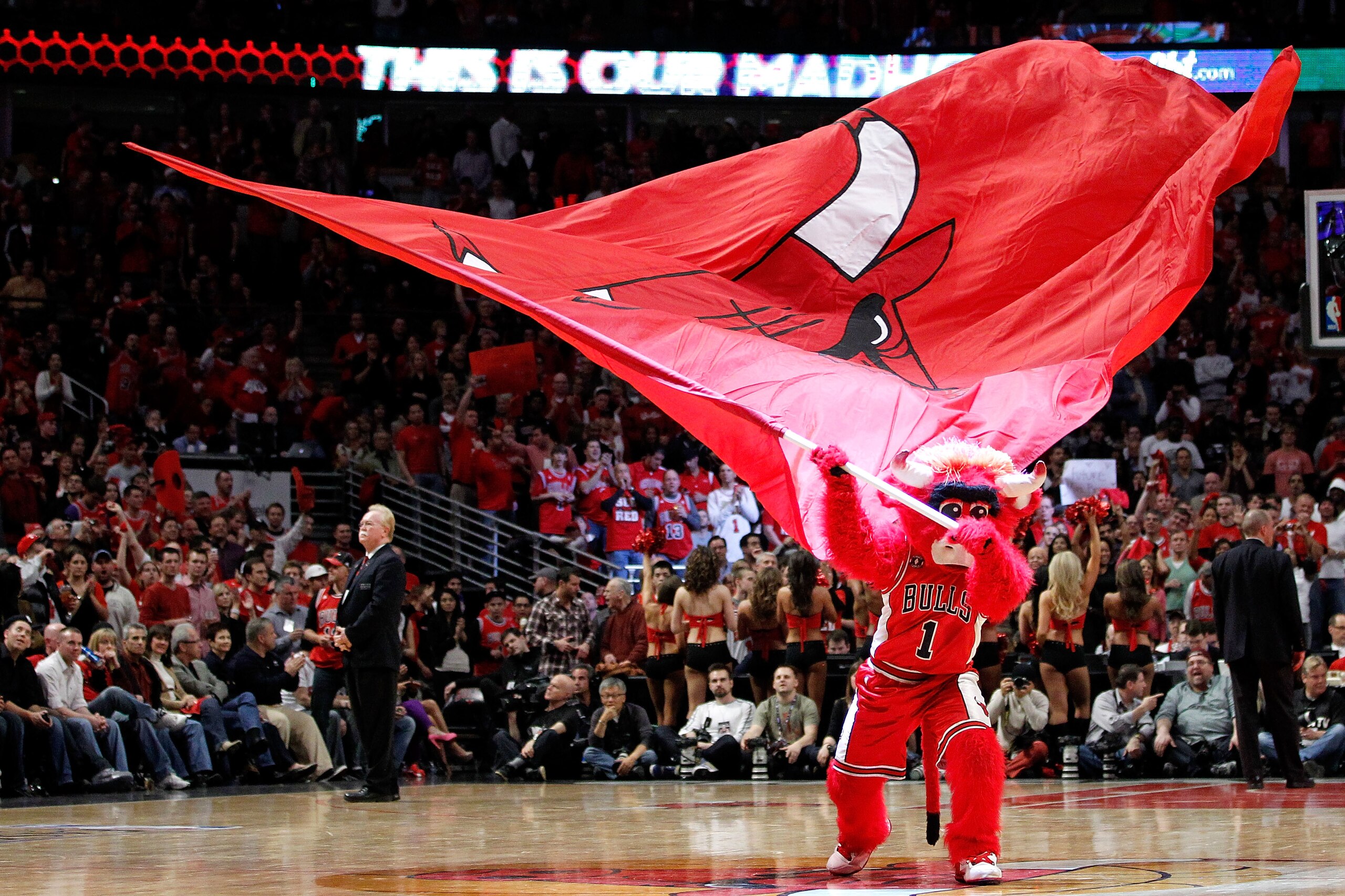 CHICAGO, IL - MAY 15: Benny the Bull mascot for the Chicago Bulls waves a giant flag as he performs against the Miami Heat in Game One of the Eastern Conference Finals during the 2011 NBA Playoffs on May 15, 2011 at the United Center in Chicago, Illinois.