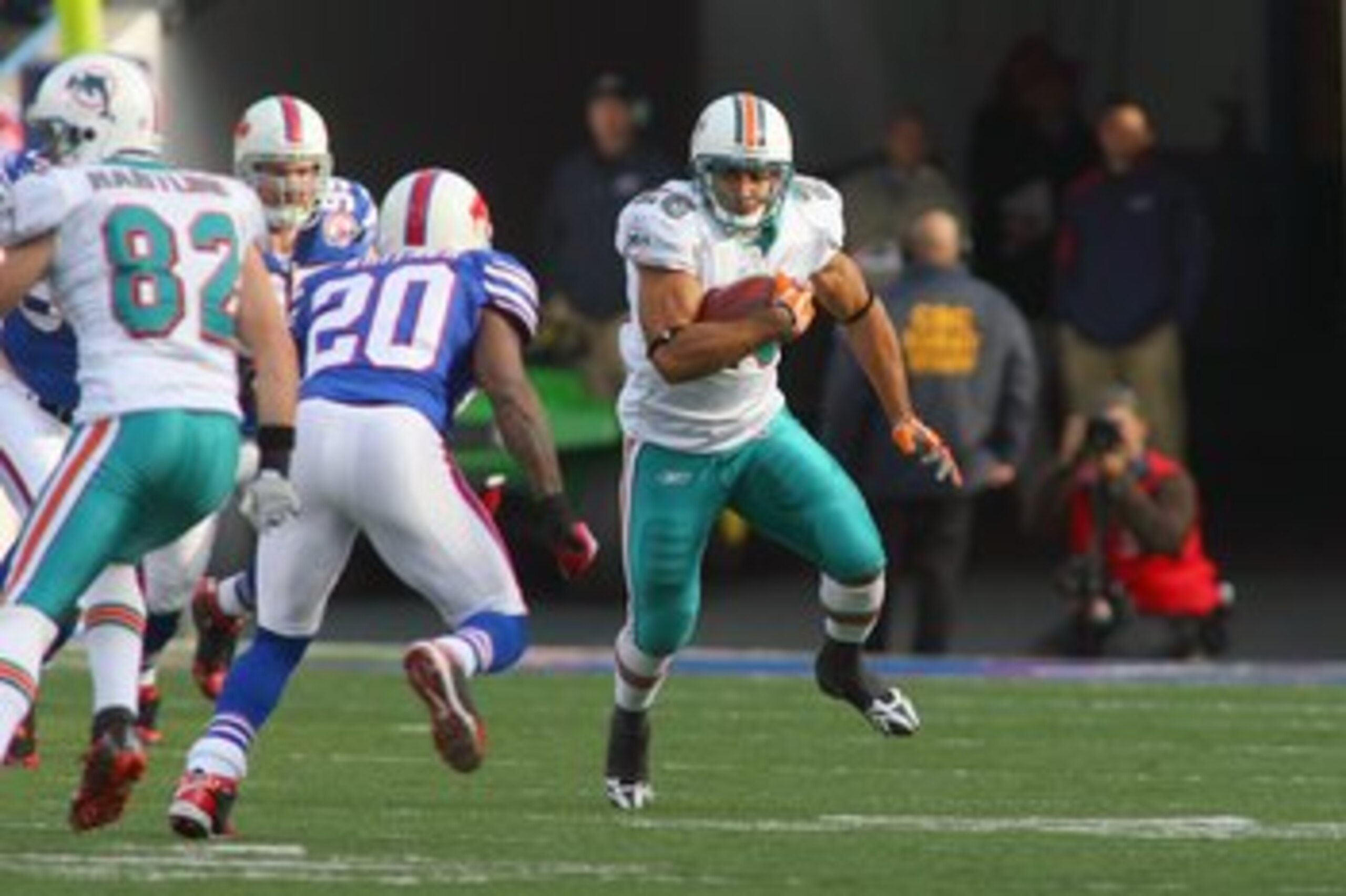 ORCHARD PARK, NY - NOVEMBER 29:  Lex Hilliard #26 of the Miami Dolphins carries the ball during the game against the Buffalo Bills at Ralph Wilson Stadium on November 29, 2009 in Orchard Park, New York. Buffalo won 31-14. (Photo by Rick Stewart/Getty Imag