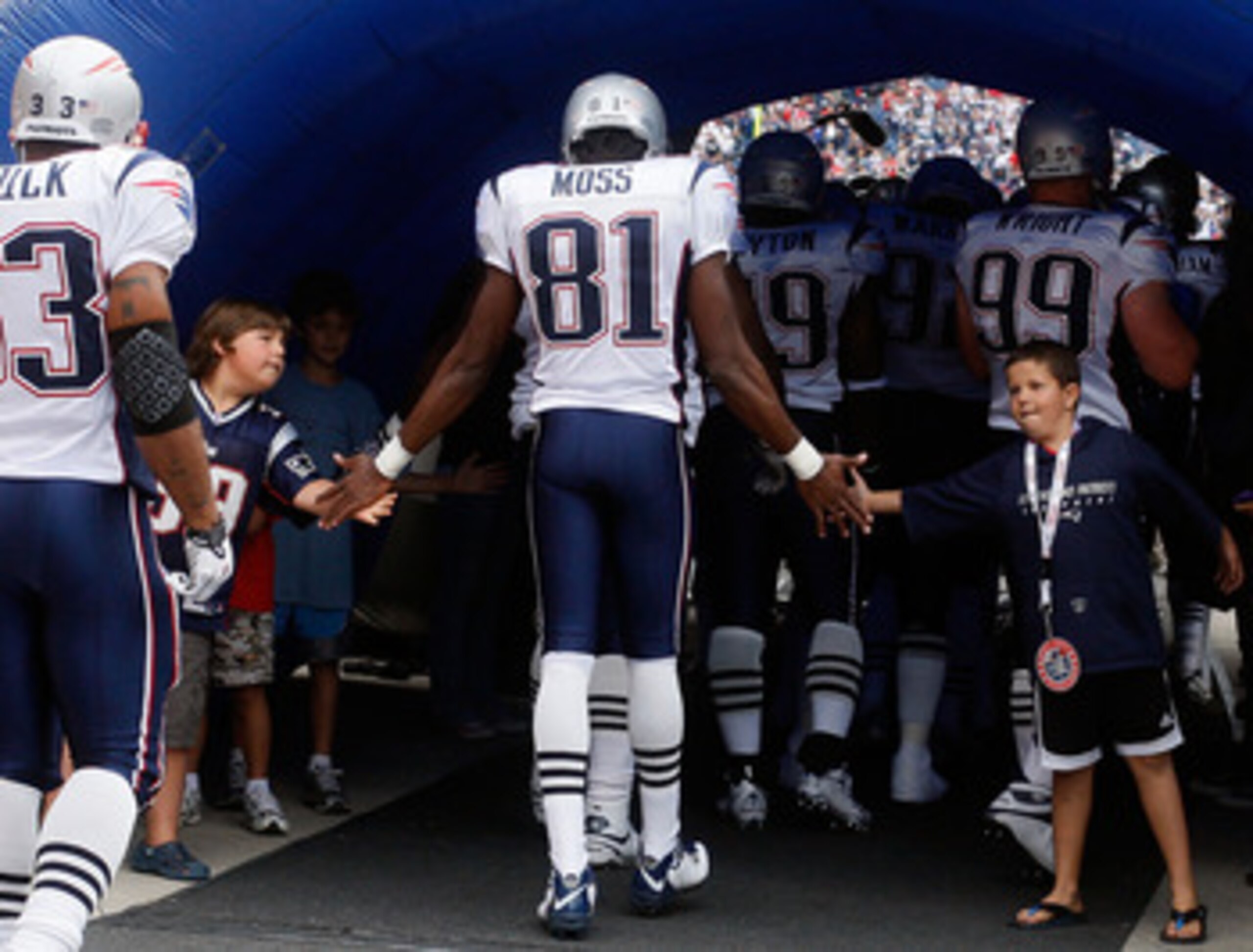 FOXBORO, MA - SEPTEMBER 12: Randy Moss #81 of the New England Patriots enters the field before the NFL season opener against the Cincinnati Bengals at Gillette Stadium on September 12, 2010 in Foxboro, Massachusetts. (Photo by Jim Rogash/Getty Images)