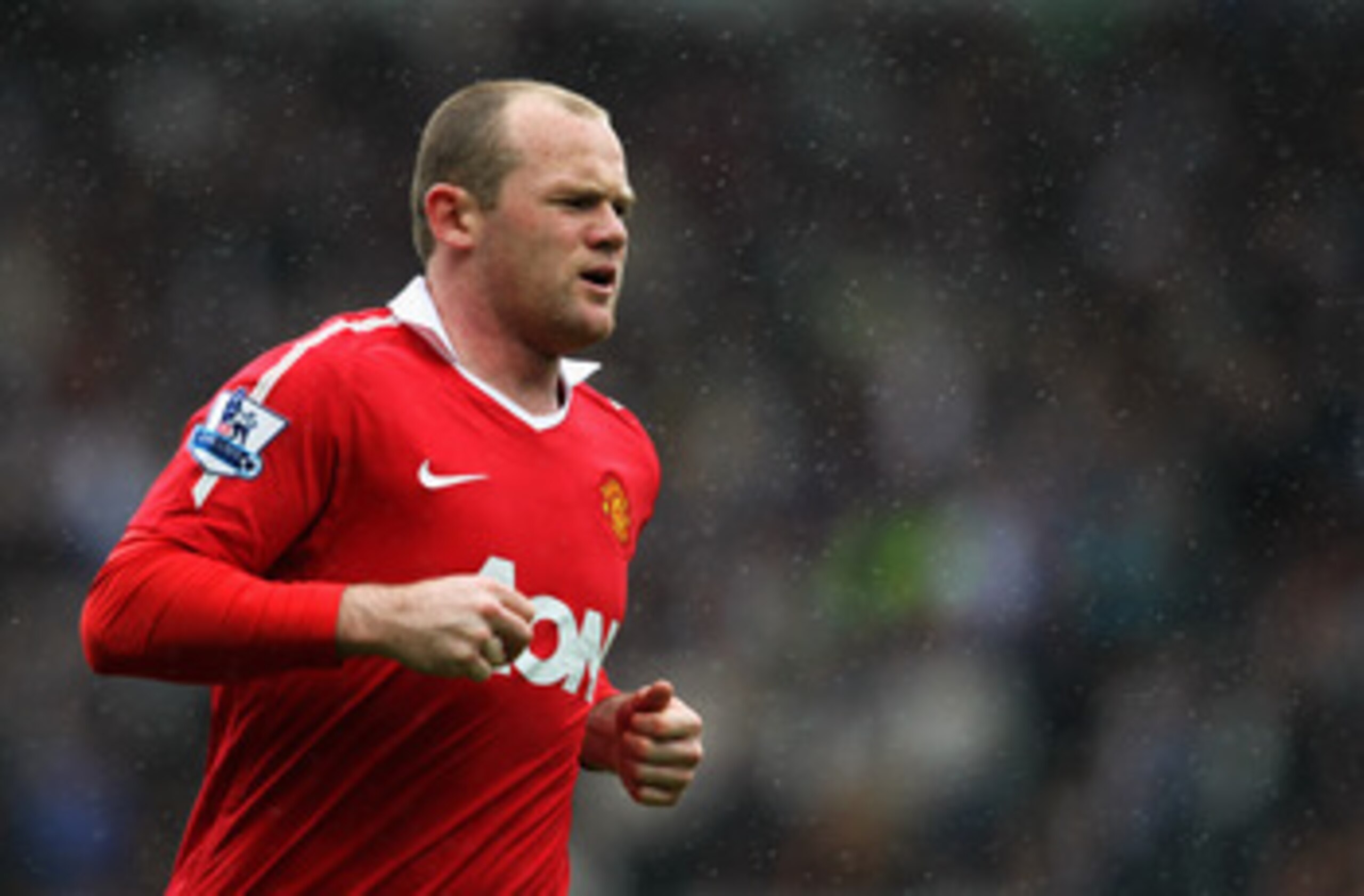 BLACKBURN, ENGLAND - MAY 14: Wayne Rooney of Manchester United in action during the Barclays Premier League match between Blackburn Rovers and Manchester United at Ewood park on May 14, 2011 in Blackburn, England. (Photo by Dean Mouhtaropoulos/Getty Ima BLACKBURN, ENGLAND - MAY 14: Wayne Rooney of Manchester United in action during the Barclays Premier League match between Blackburn Rovers and Manchester United at Ewood park on May 14, 2011 in Blackburn, England. (Photo by Dean Mouhtaropoulos/Getty Ima