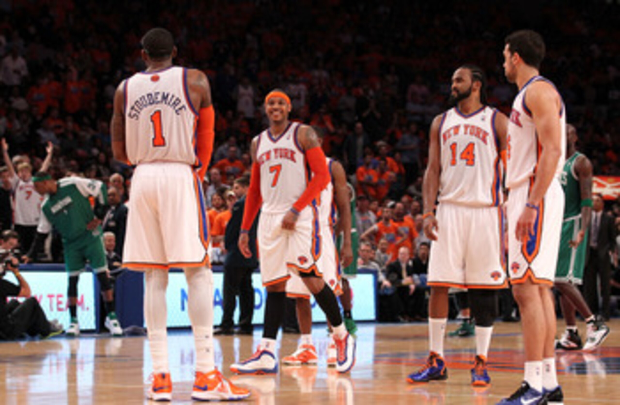 NEW YORK, NY - APRIL 24:  (L-R) Amar'e Stoudemire #1, Carmelo Anthony #7, Ronny Turiaf #14 and Landry Fields #6 of the New York Knicks look on against the Boston Celtics in Game Four of the Eastern Conference Quarterfinals during the 2011 NBA Playoffs on
