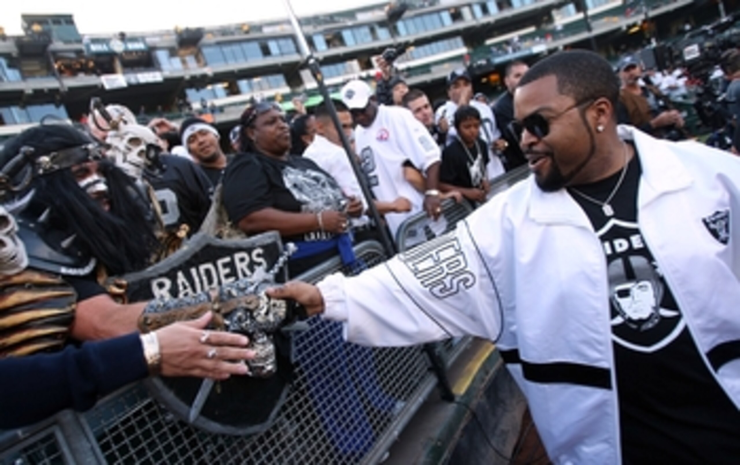 OAKLAND, CA - SEPTEMBER 14:  Actor Ice Cube greets fans of the Oakland Raiders prior to the Raiders playing against the San Diego Chargers on September 14, 2009 at the Oakland-Alameda County Coliseum in Oakland, California.  (Photo by (Ezra Shaw/Getty Ima