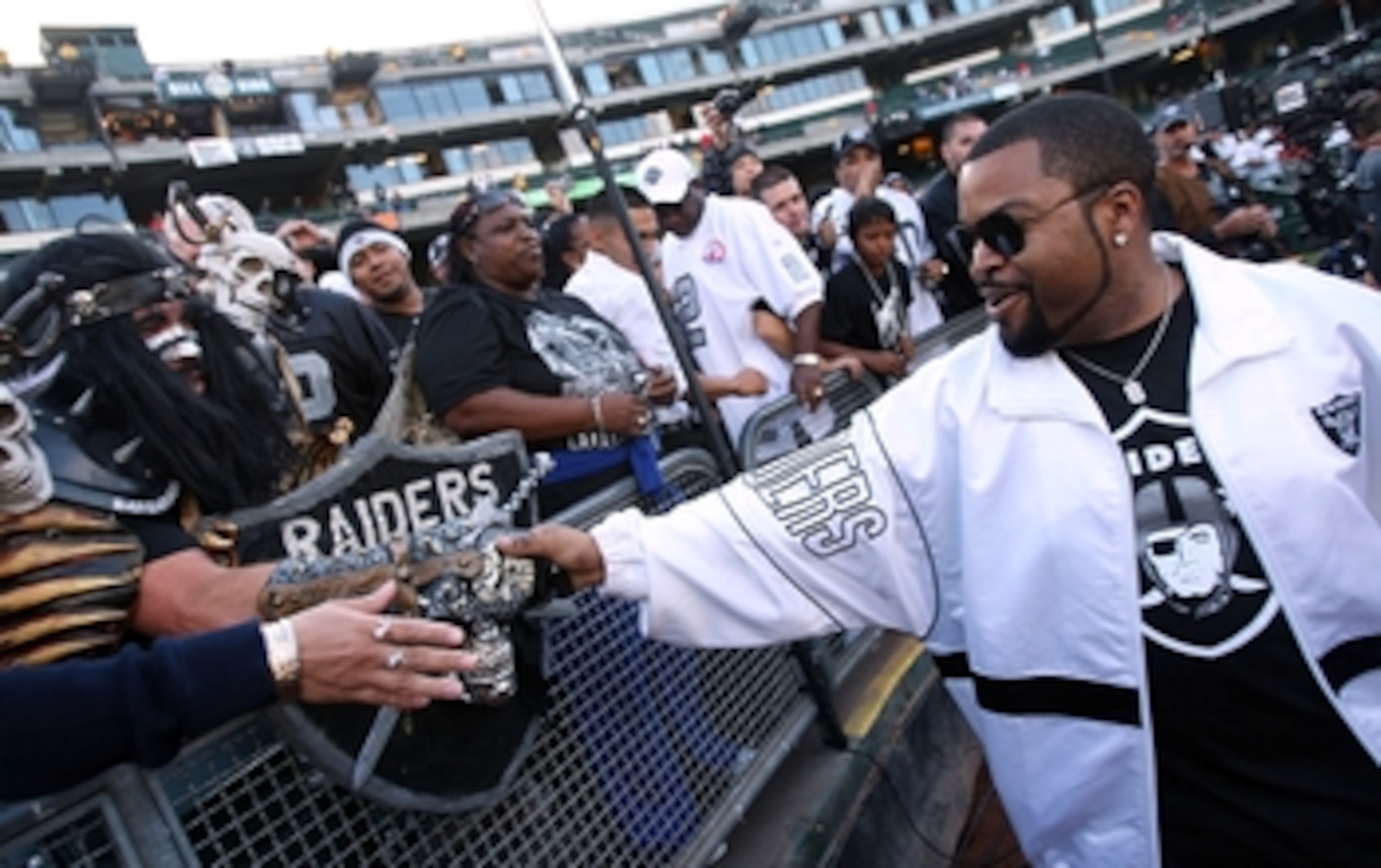 OAKLAND, CA - SEPTEMBER 14:  Actor Ice Cube greets fans of the Oakland Raiders prior to the Raiders playing against the San Diego Chargers on September 14, 2009 at the Oakland-Alameda County Coliseum in Oakland, California.  (Photo by (Ezra Shaw/Getty Ima