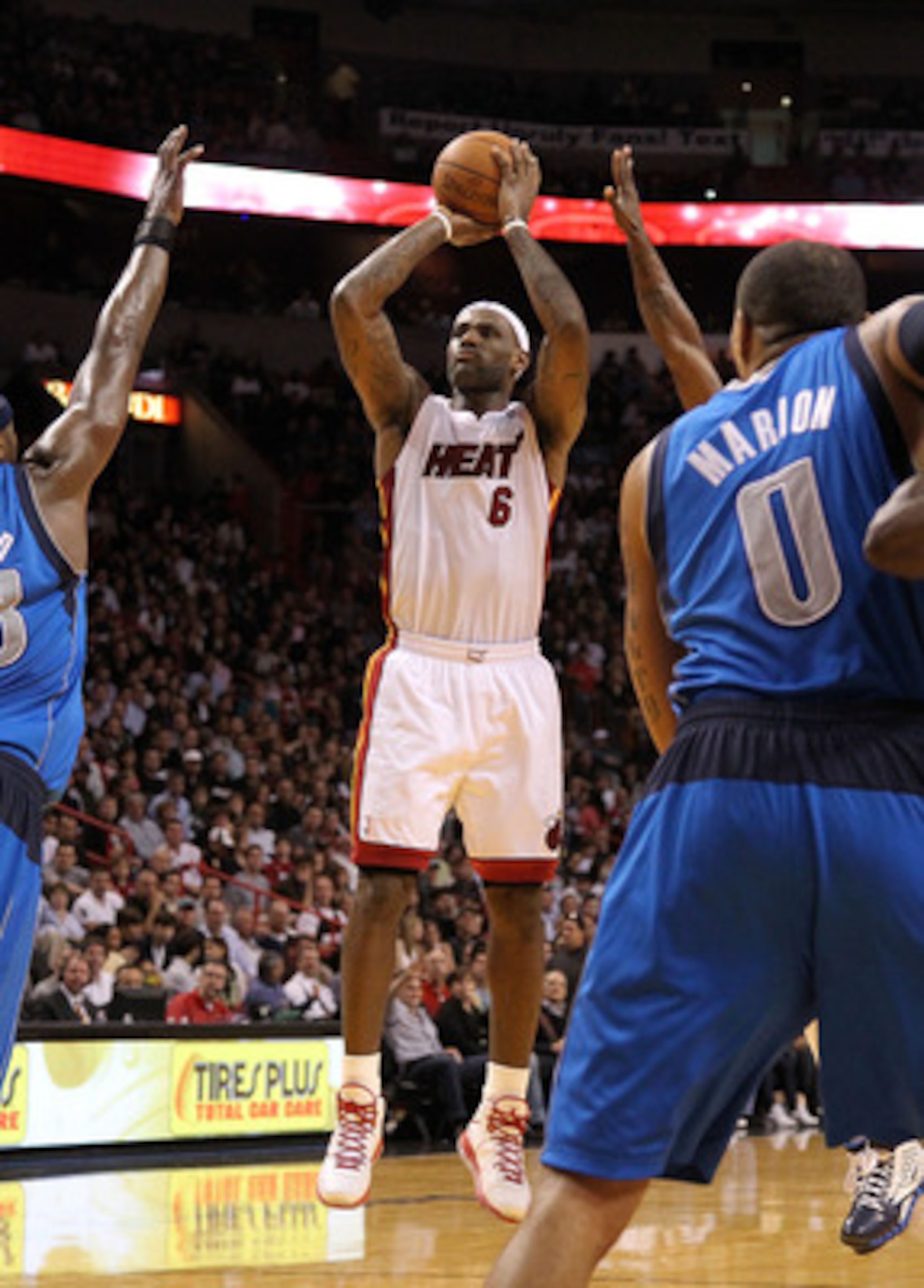 MIAMI, FL - DECEMBER 20: LeBron James #6 of the Miami Heat shoots a jump shotduring a game against the Dallas Mavericks at American Airlines Arena on December 20, 2010 in Miami, Florida. NOTE TO USER: User expressly acknowledges and agrees that, by downlo MIAMI, FL - DECEMBER 20: LeBron James #6 of the Miami Heat shoots a jump shotduring a game against the Dallas Mavericks at American Airlines Arena on December 20, 2010 in Miami, Florida. NOTE TO USER: User expressly acknowledges and agrees that, by downlo