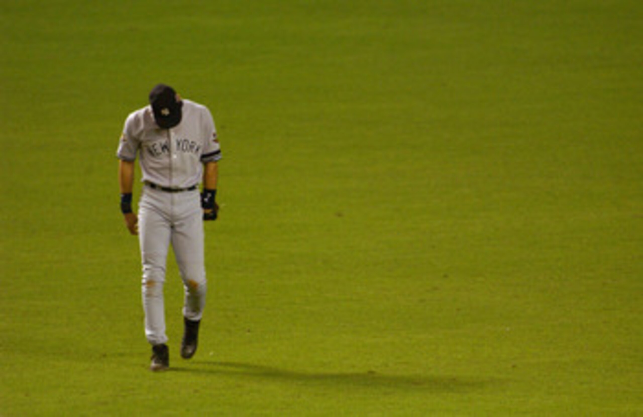 4 Nov 2001:  Derek Jeter #2 of the New York Yankees appears dejected against the Arizona Diamondbacks during game seven of the Major League Baseball World Series at Bank One Ballpark in Phoenix, Arizona. The Diamondbacks won 3-2 to capture the World Serie
