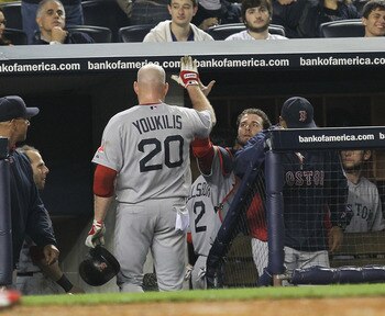 NEW YORK, NY - MAY 15:  Kevin Youkilis #20 of the Boston Red Sox celebrates his home run in the third inning against the New York Yankees during their game on May 15, 2011 at Yankee Stadium in the Bronx borough of New York City.  (Photo by Al Bello/Getty 