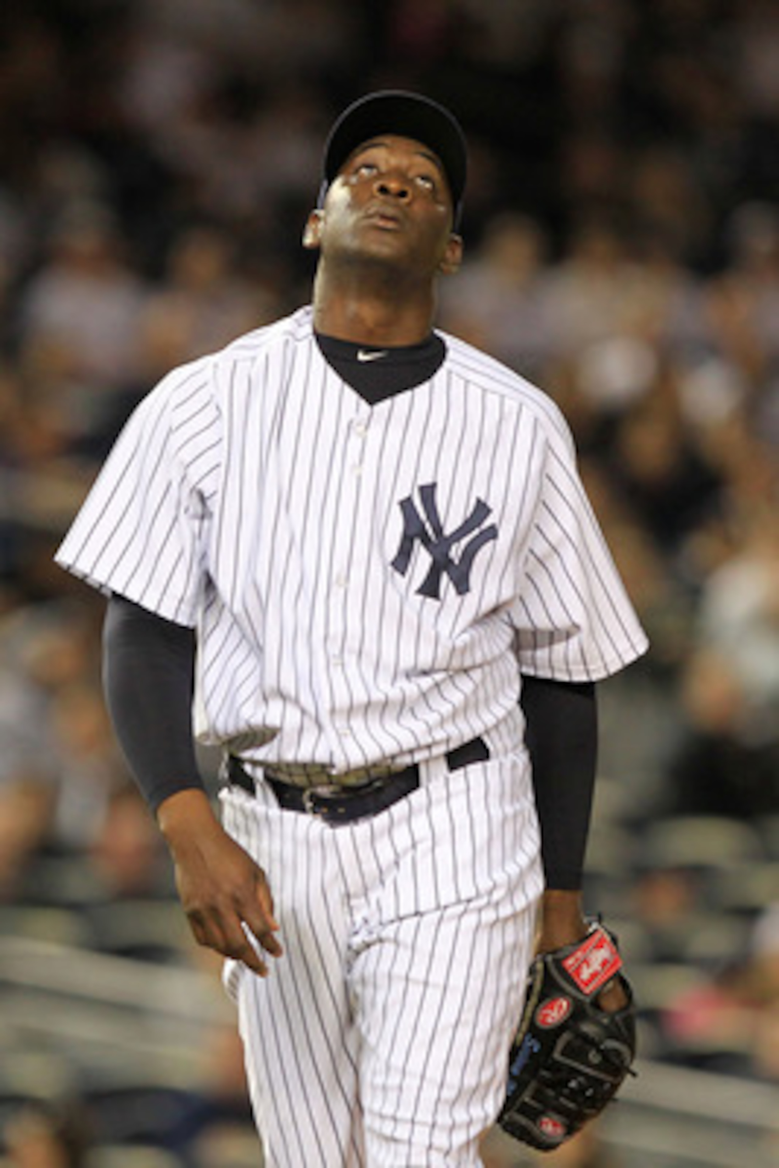 NEW YORK, NY - APRIL 26:  Rafael Soriano #29 of the New York Yankees walks to the dugout after the top of the eighth inning against the Chicago White Sox at Yankee Stadium on April 26, 2011 in the Bronx borough of New York City.  (Photo by Chris Trotman/G