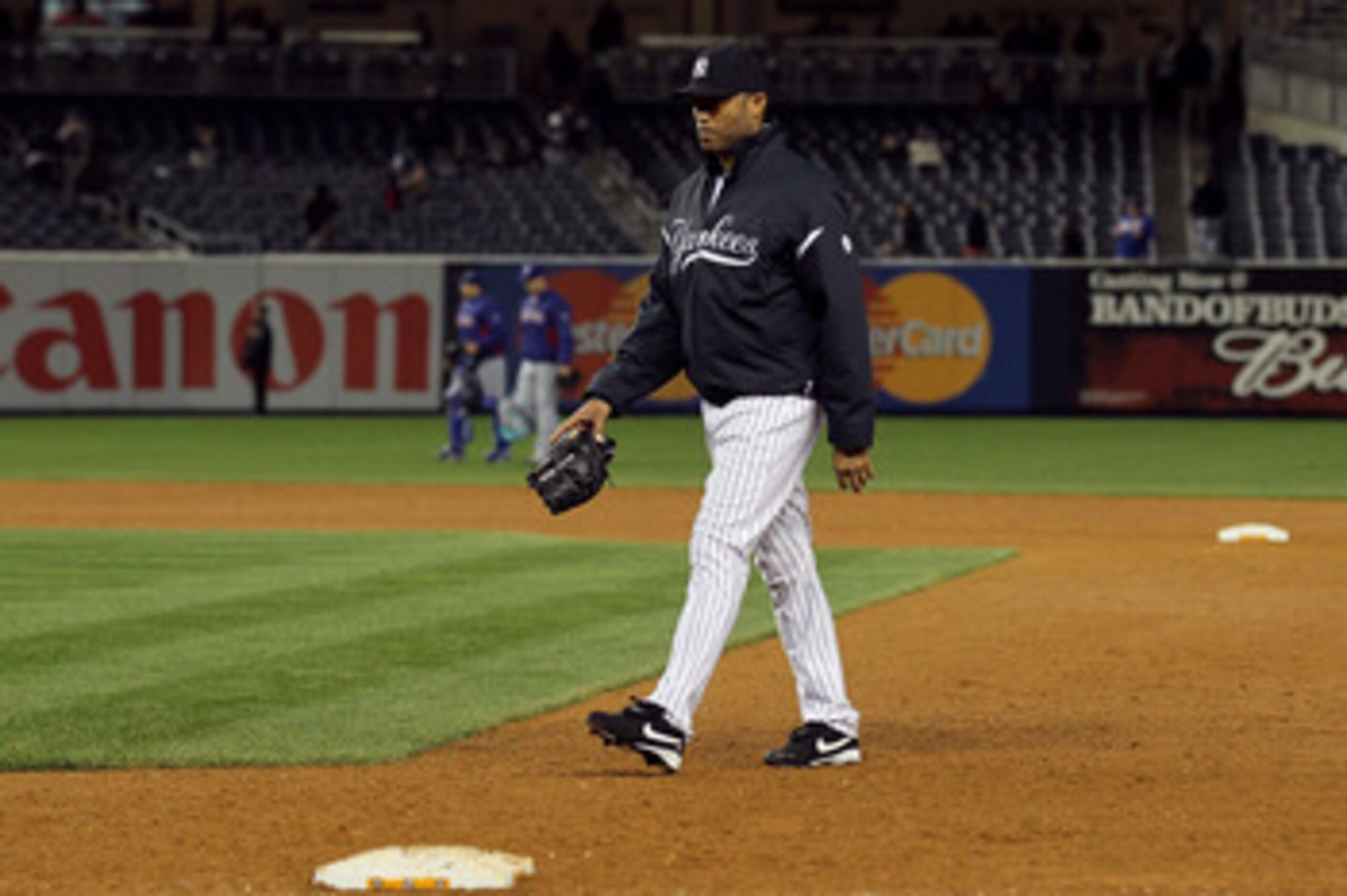 NEW YORK - OCTOBER 19:  Mariano Rivera #42 of of the New York Yankees walks dejected from the bullpen back to the dugout after the Yankees lost 10-3 against the Texas Rangers in Game Four of the ALCS during the 2010 MLB Playoffs at Yankee Stadium on Octob