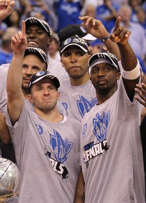 DALLAS, TX - MAY 25:  Jason Kidd #2, Jose Juan Barea #11, Shawn Marion #0 and Jason Terry #31 and the Dallas Mavericks celebrate their 100-96 victory against the Oklahoma City Thunder in Game Five of the Western Conference Finals during the 2011 NBA Playo