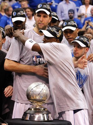 DALLAS, TX - MAY 25:  Dirk Nowitzki #41, Jason Terry #31 and the Dallas Mavericks celebrate their 100-96 victory against the Oklahoma City Thunder in Game Five of the Western Conference Finals during the 2011 NBA Playoffs at American Airlines Center on Ma