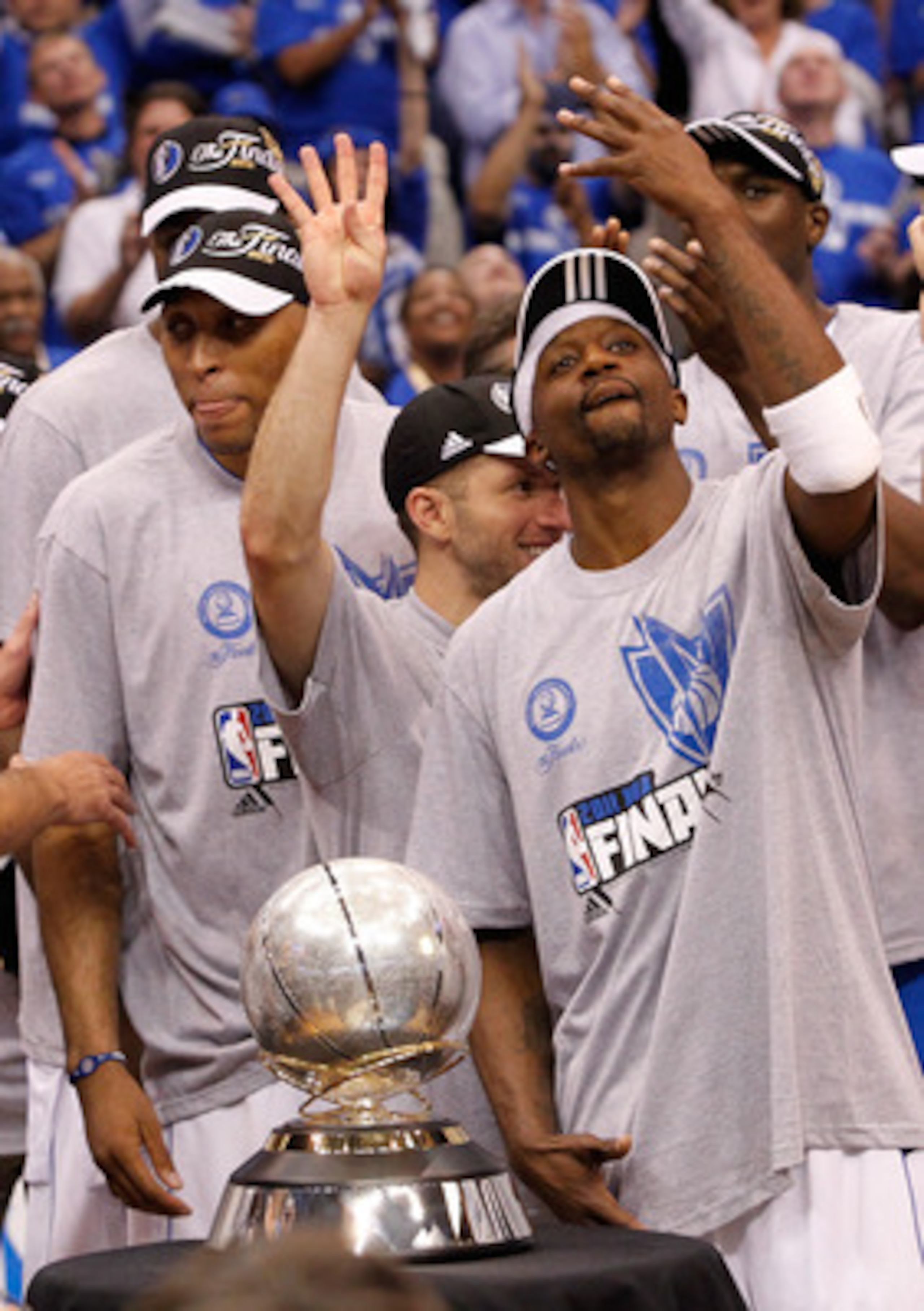 DALLAS, TX - MAY 25:  Jason Terry #31 and Jose Juan Barea #11 and the Dallas Mavericks celebrate their 100-96 victory against the Oklahoma City Thunder in Game Five of the Western Conference Finals during the 2011 NBA Playoffs at American Airlines Center 