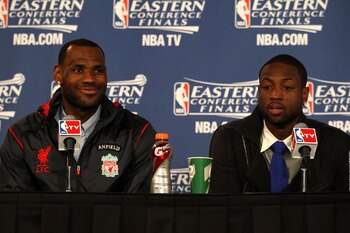 CHICAGO, IL - MAY 26:  (L-R) LeBron James #6 and Dwyane Wade of the Miami Heat answers questions from the media at the post game press conference after the Heat won 83-80 against the Chicago Bulls in Game Five of the Eastern Conference Finals during the 2