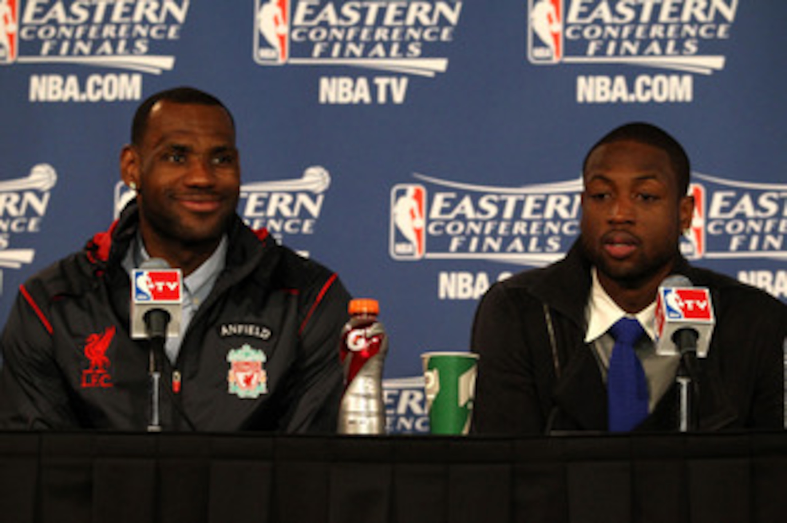 CHICAGO, IL - MAY 26:  (L-R) LeBron James #6 and Dwyane Wade of the Miami Heat answers questions from the media at the post game press conference after the Heat won 83-80 against the Chicago Bulls in Game Five of the Eastern Conference Finals during the 2