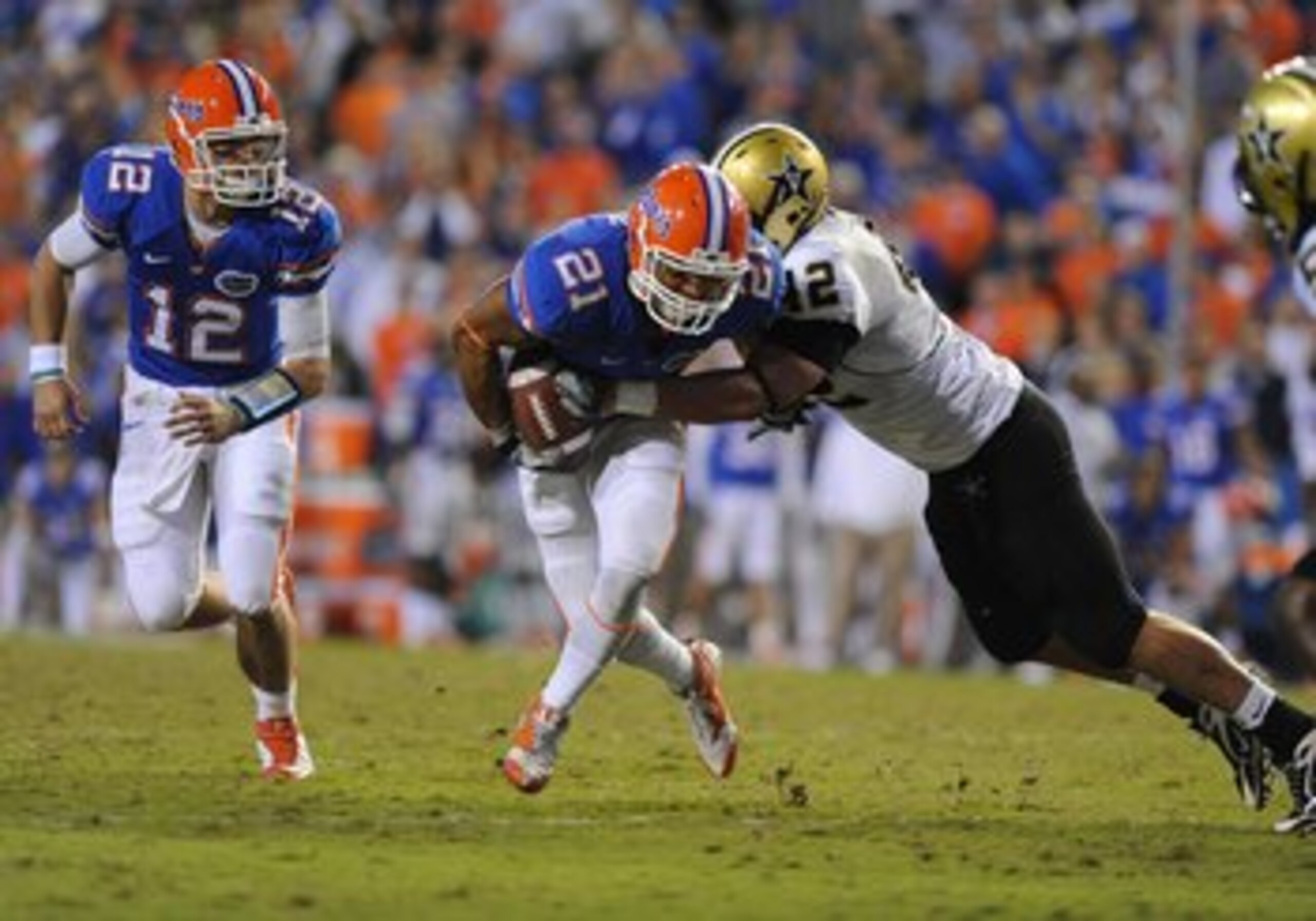 GAINESVILLE, FL - NOVEMBER 7: Running back Emmanuel Moody #21 of the Florida Gators rushes upfield against the Vanderbilt Commodores on November 7, 2009 at Ben Hill Griffin Stadium in Gainesville, Florida. (Photo by Al Messerschmidt/Getty Images) GAINESVILLE, FL - NOVEMBER 7: Running back Emmanuel Moody #21 of the Florida Gators rushes upfield against the Vanderbilt Commodores on November 7, 2009 at Ben Hill Griffin Stadium in Gainesville, Florida. (Photo by Al Messerschmidt/Getty Images)