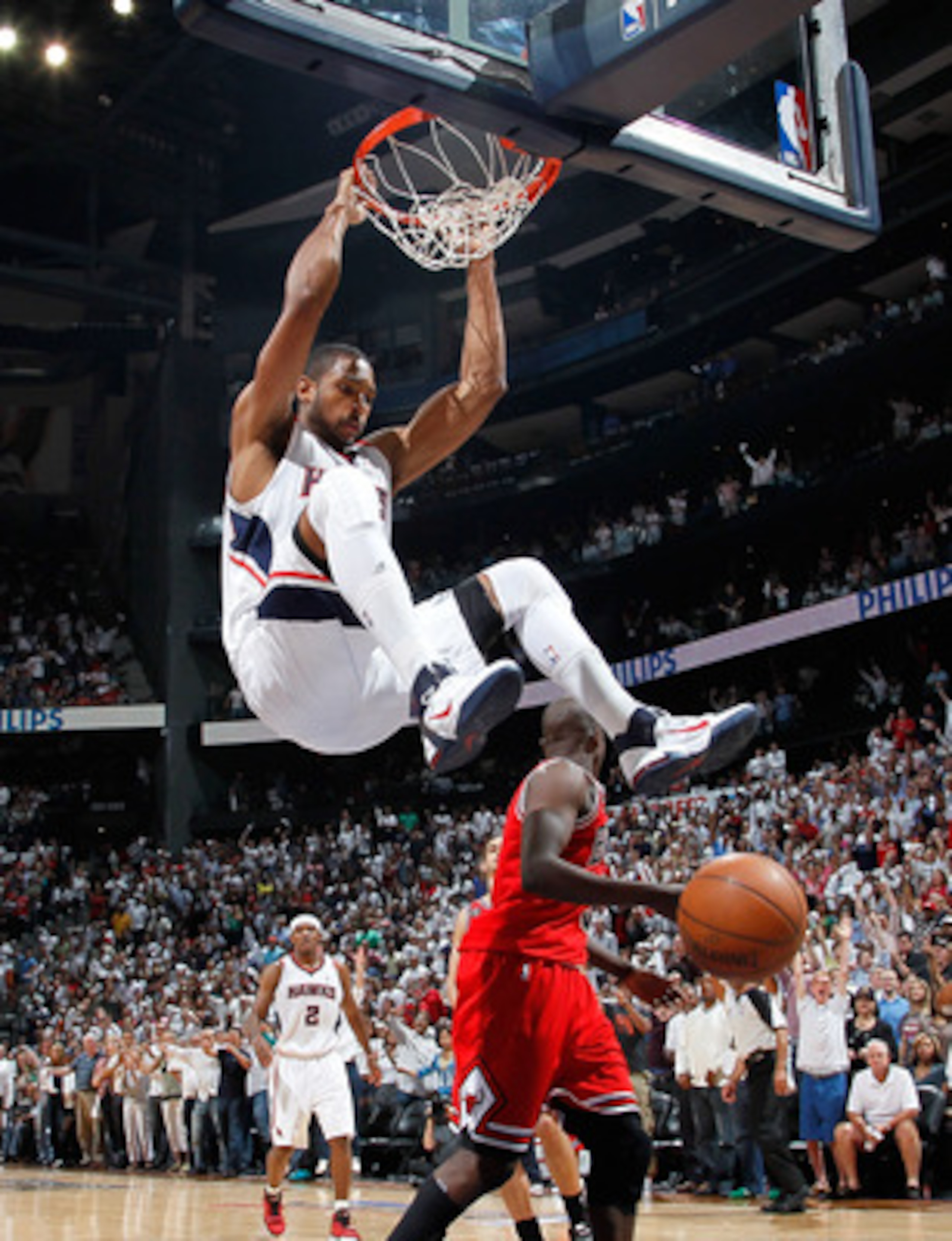 ATLANTA, GA - MAY 08:  Al Horford #15 of the Atlanta Hawks dunks against Luol Deng #9 of the Chicago Bulls in Game Four of the Eastern Conference Semifinals in the 2011 NBA Playoffs at Phillips Arena on May 8, 2011 in Atlanta, Georgia.  NOTE TO USER: User