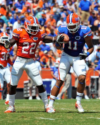 GAINESVILLE, FL - APRIL 9:  Tight end Jordan Reed #11 of the Florida Gators grabs a ball in front of safety Matt Elam #22 during the Orange and Blue spring football game April 9, 2010 Ben Hill Griffin Stadium in Gainesville, Florida.  (Photo by Al Messers