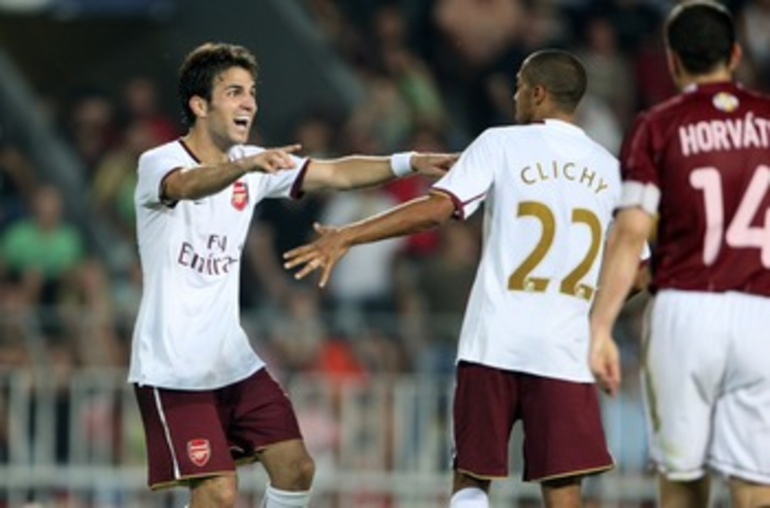 PRAGUE, CZECH REPUBLIC - AUGUST 15:  Cesc Fabregas of Arsenal celabrates his goal with Gael Clichy against Sparta Prague during the Champions League 3rd qualifying round 1st leg  between Sparta Prague and Arsenal at the Sparta Stadium on August 15, 2007 i