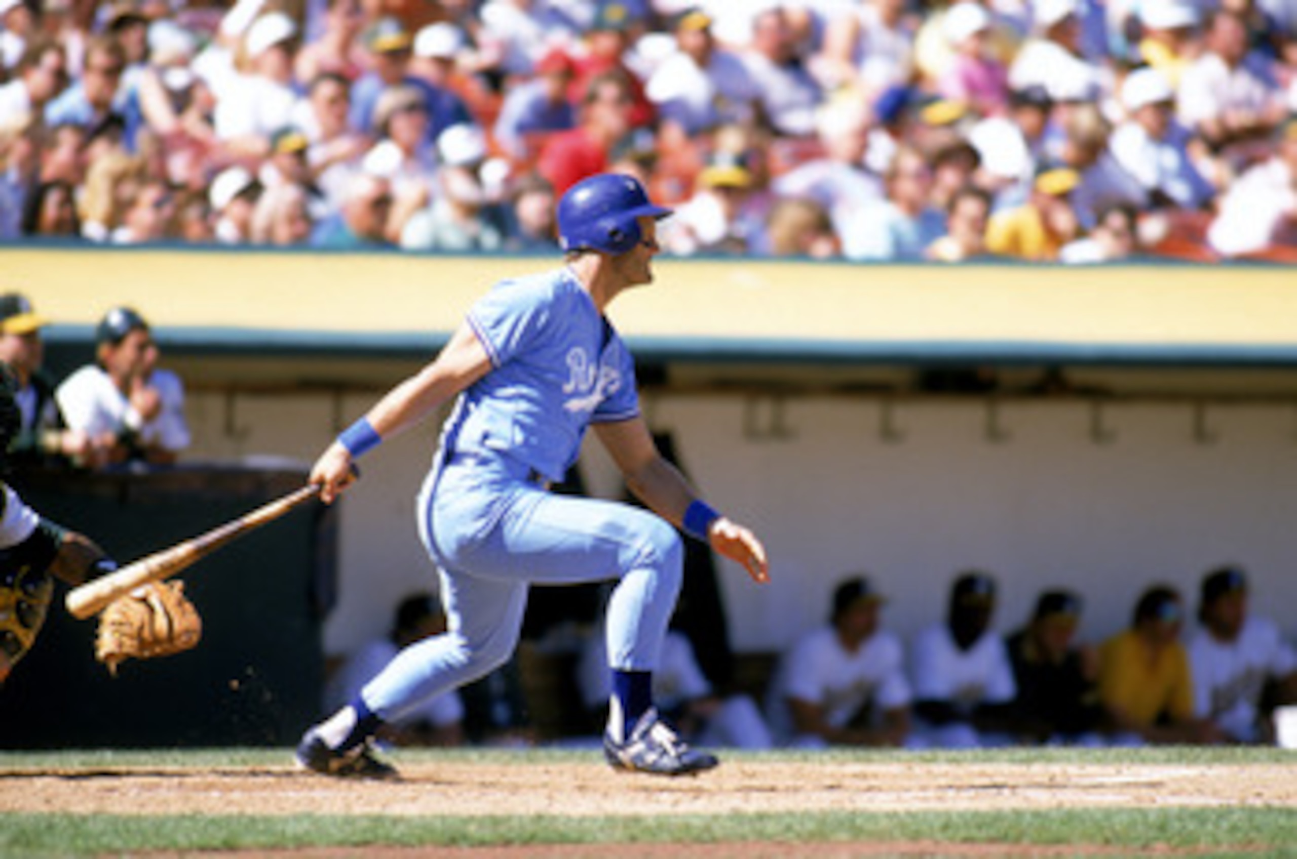 OAKLAND, CA - 1989:  George Brett #5 of the Kansas City Royals watches the flight of the ball as he follows through on his swings during a game against the Oakland Athletics at Oakland-Alameda County Coliseum in 1989 in Oakland, California.  (Photo by Ott