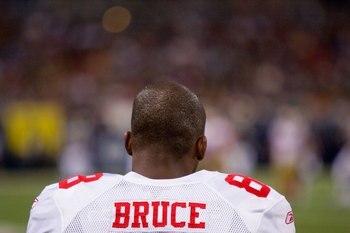 ST. LOUIS - JANUARY 3:  Isaac Bruce #88 of the San Francisco 49ers watches the action from the sidelines during the game against the St. Louis Rams at the Edward Jones Dome on January 3, 2010 in St. Louis, Missouri.  The 49ers beat the Rams 28-6.  (Photo