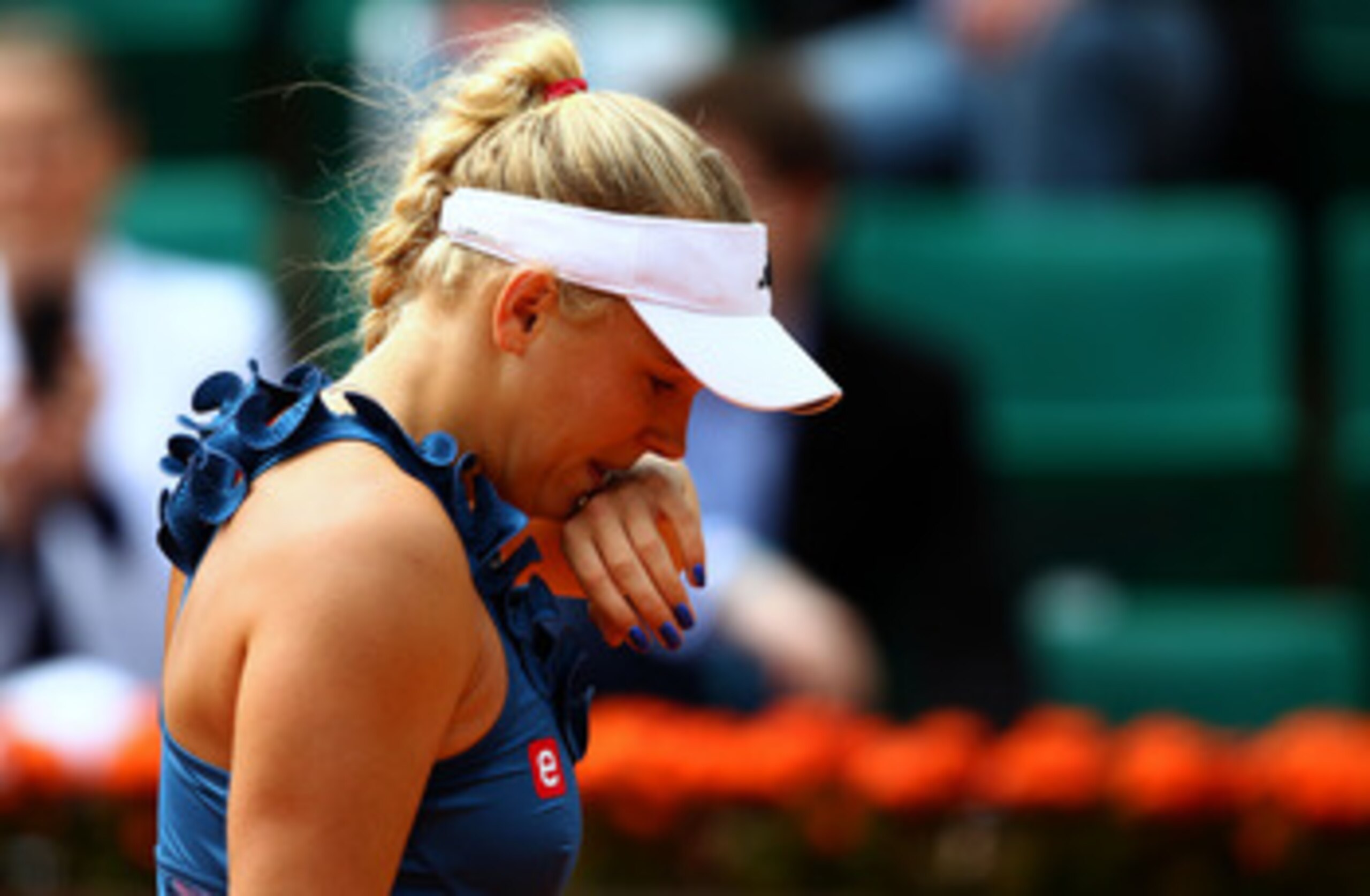 PARIS, FRANCE - MAY 27:  Caroline Wozniacki of Denmark shows her dejection during the women's singles round three match between Caroline Wozniacki of Denmark and Daniela Hantuchova of Slovakia on day six of the French Open at Roland Garros on May 27, 2011