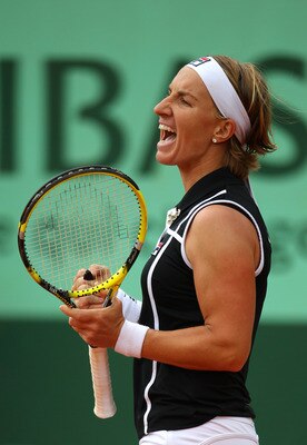 PARIS, FRANCE - MAY 27:  Svetlana Kuznetsova of Russia celebrates matchpoint during the women's singles round three match between Rebecca Marino of Canada and Svetlana Kuznetsova of Russia on day six of the French Open at Roland Garros on May 27, 2011 in 