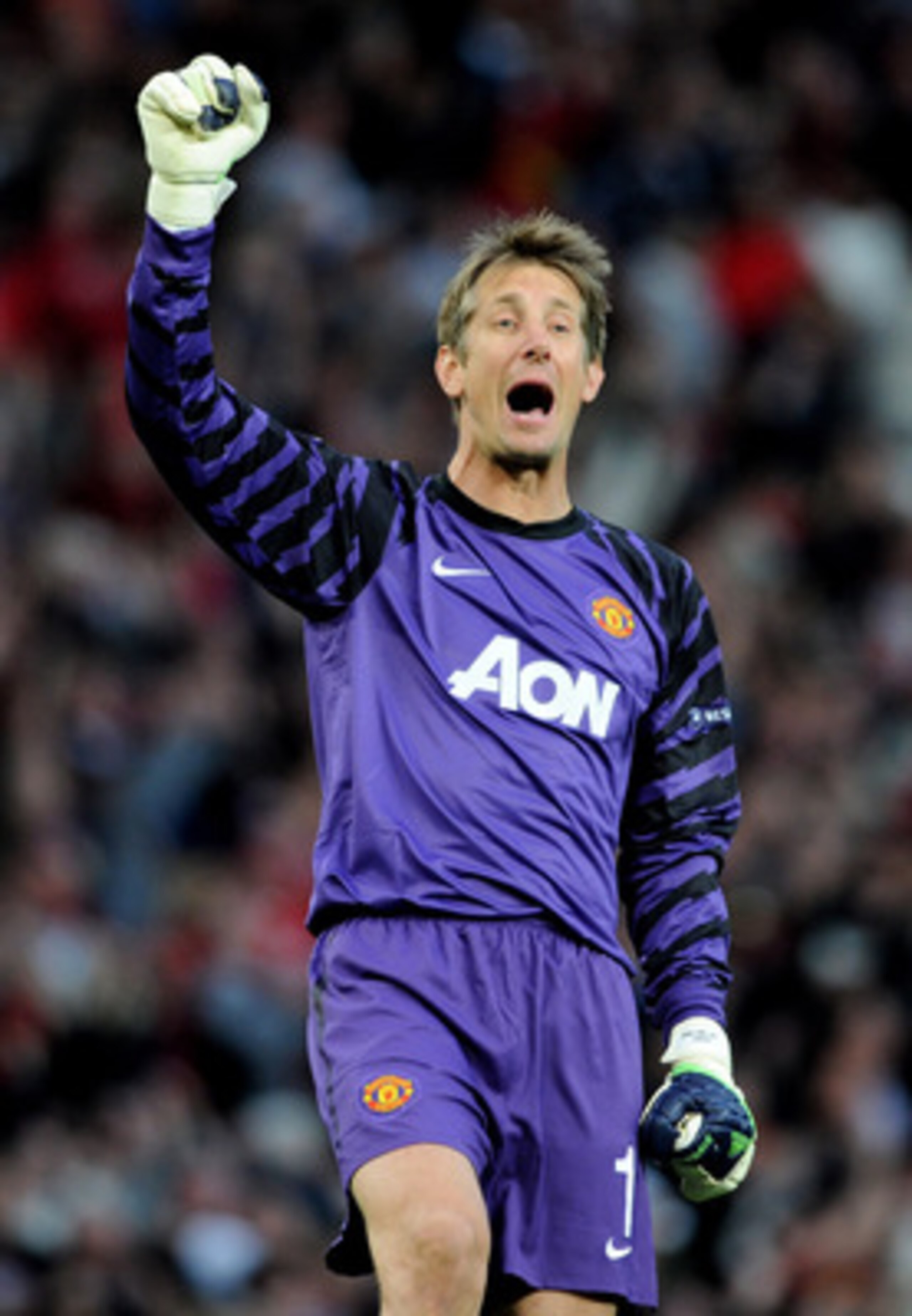 MANCHESTER, ENGLAND - MAY 04:  Edwin van der Sar of Manchester United celebrates after his team's second goal during the UEFA Champions League Semi Final second leg match between Manchester United and Schalke at Old Trafford on May 4, 2011 in Manchester, 