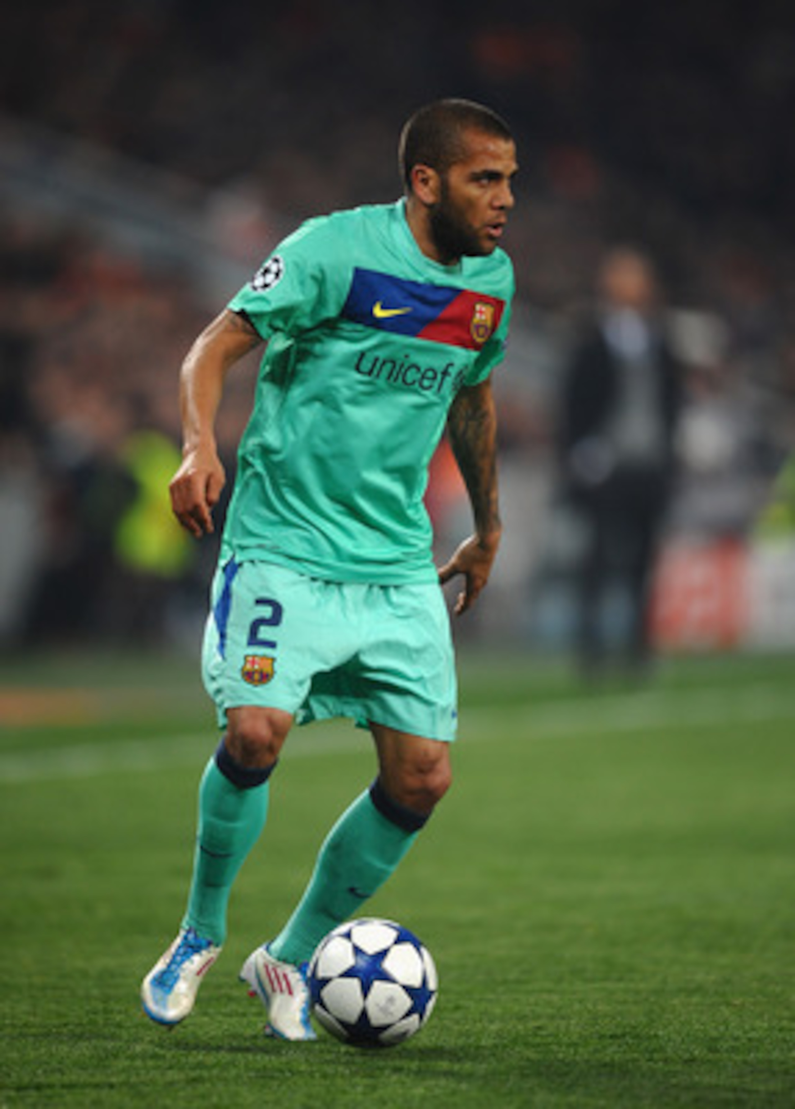 DONETSK, UKRAINE - APRIL 12: Daniel Alves of Barcelona in action during the UEFA Champions League Quarter Final 2nd Leg match between Shakhtar Donetsk and Barcelona at the Donbass Arena on April 12, 2011 in Donetsk, Ukraine.  (Photo by Laurence Griffiths/