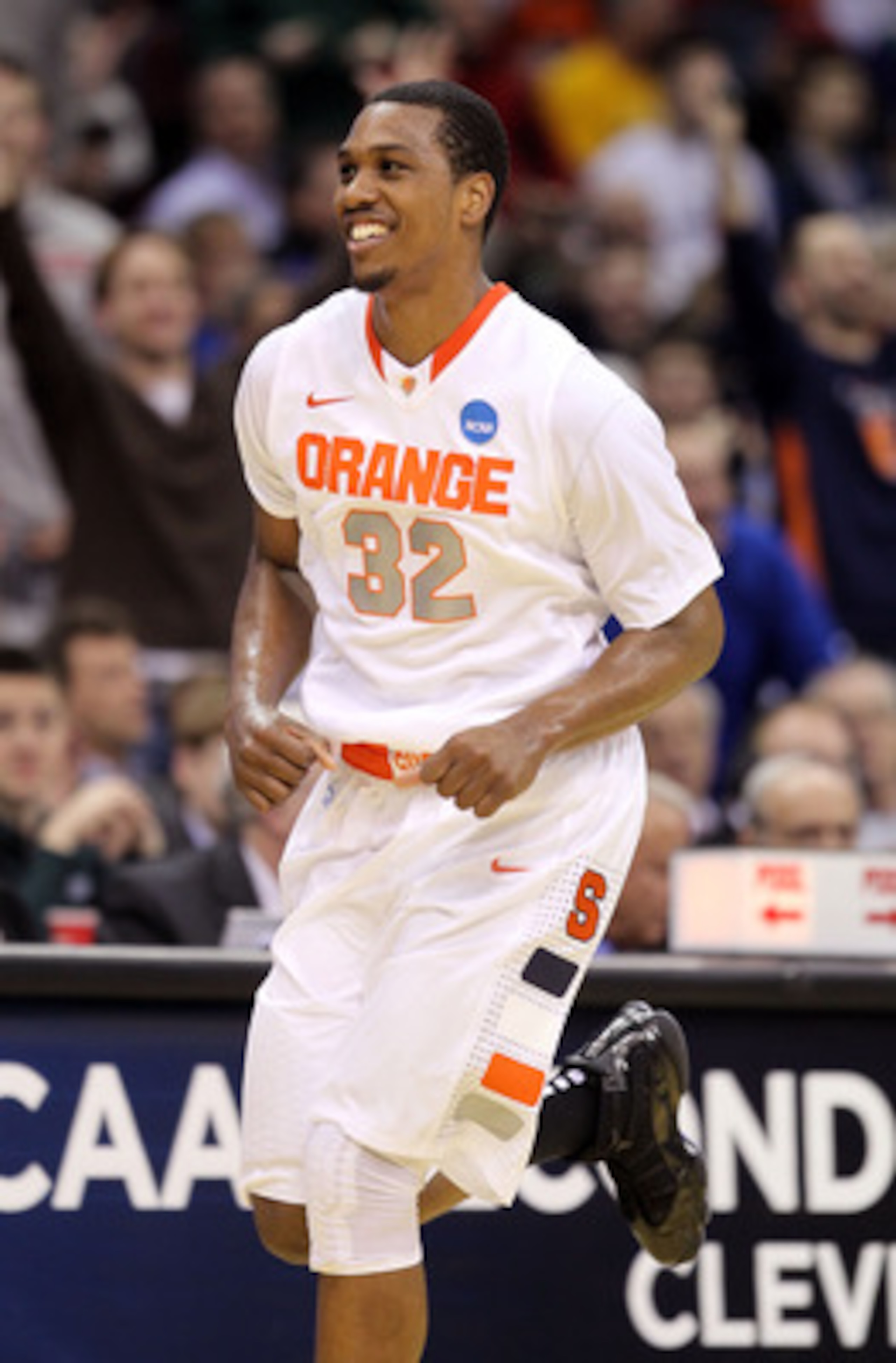 CLEVELAND, OH - MARCH 18: Kris Joseph #32 of the Syracuse Orange smiles after a play against the Indiana State Sycamores during the second round of the 2011 NCAA men's basketball tournament at Quicken Loans Arena on March 18, 2011 in Cleveland, Ohio. (Ph CLEVELAND, OH - MARCH 18: Kris Joseph #32 of the Syracuse Orange smiles after a play against the Indiana State Sycamores during the second round of the 2011 NCAA men's basketball tournament at Quicken Loans Arena on March 18, 2011 in Cleveland, Ohio. (Ph
