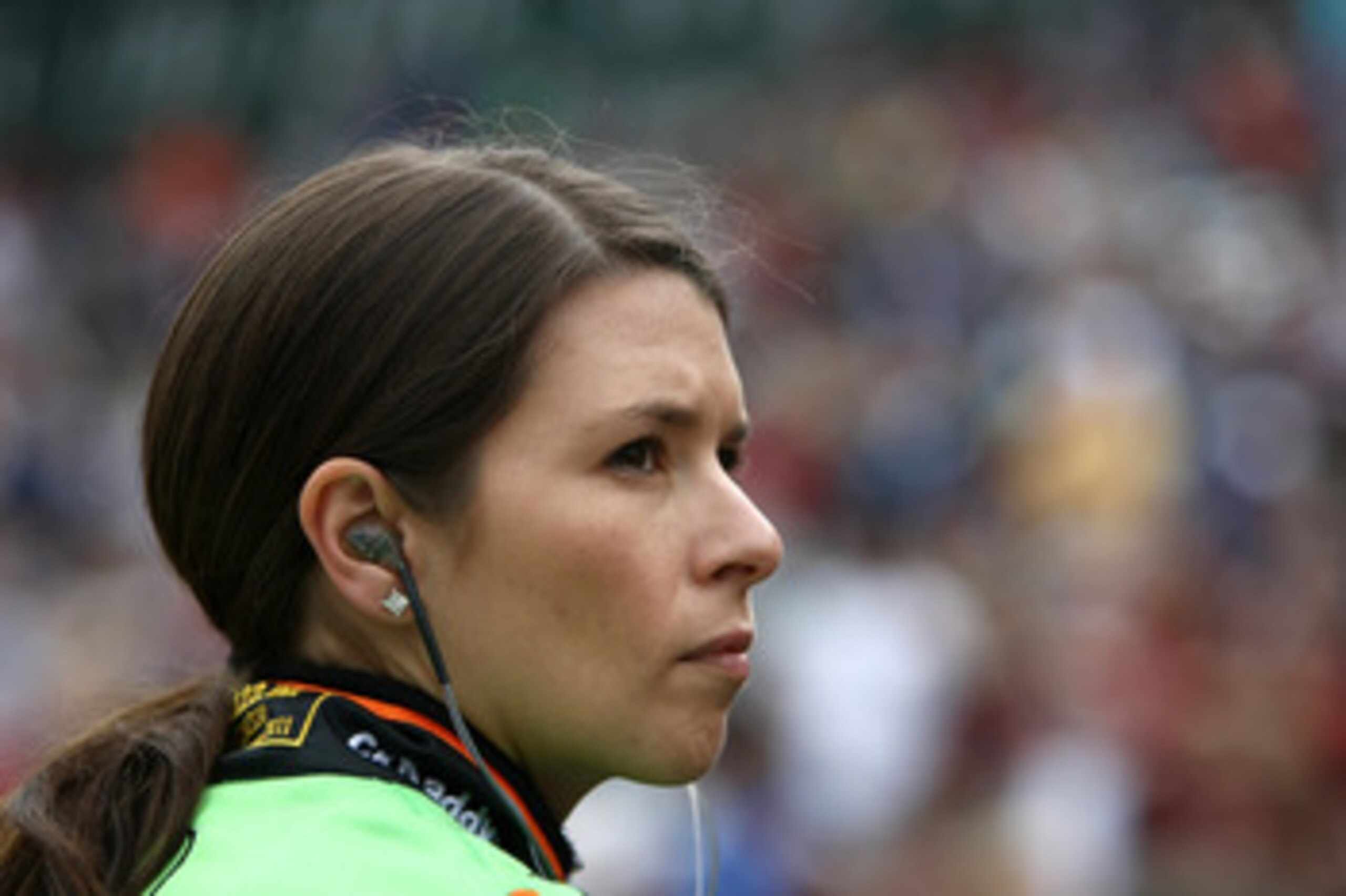 INDIANAPOLIS, IN - MAY 27: Danica Patrick, driver of the #7 Team Go Daddy Andretti autosport Dallara Honda, looks on during final practice on Carb Day for the the 95th Indianapolis 500 Mile Race at the Indianapolis Motor Speedway on May 27, 2011 in India INDIANAPOLIS, IN - MAY 27: Danica Patrick, driver of the #7 Team Go Daddy Andretti autosport Dallara Honda, looks on during final practice on Carb Day for the the 95th Indianapolis 500 Mile Race at the Indianapolis Motor Speedway on May 27, 2011 in India