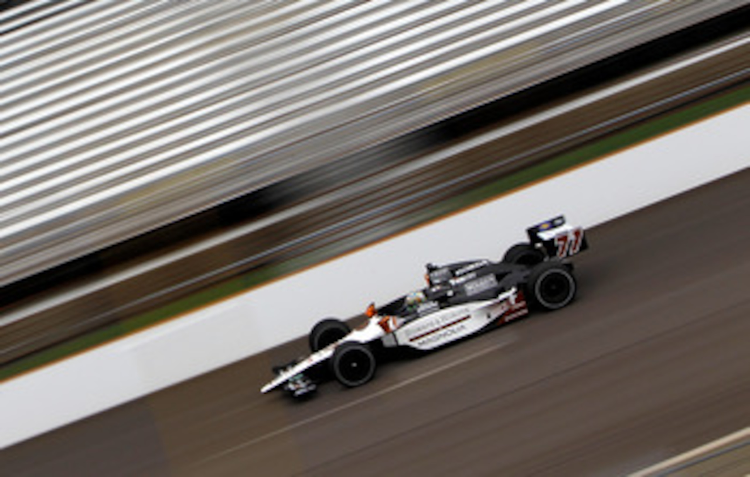 INDIANAPOLIS, IN - MAY 27: Pole sitter Alex Tagliani, driver of the #77 Bowers & Wilkins/ Sam Schmidt Motorsports Dallara Honda, races during final practice on Carb Day for the the 95th Indianapolis 500 Mile Race at the Indianapolis Motor Speedway on May INDIANAPOLIS, IN - MAY 27: Pole sitter Alex Tagliani, driver of the #77 Bowers & Wilkins/ Sam Schmidt Motorsports Dallara Honda, races during final practice on Carb Day for the the 95th Indianapolis 500 Mile Race at the Indianapolis Motor Speedway on May