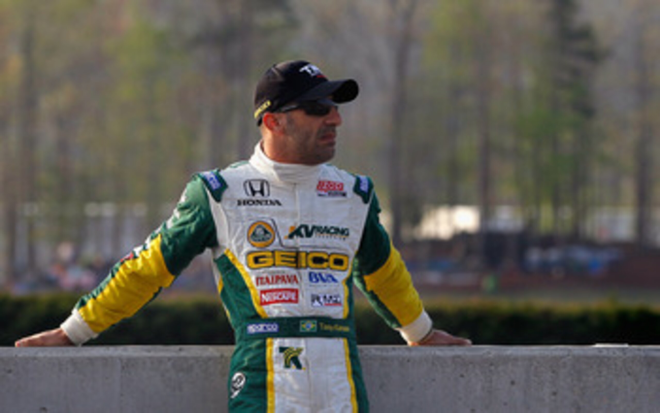 BIRMINGHAM, AL - APRIL 09: Tony Kanaan of Brazil, driver of the #82 KV Racing Technology-Lotus Dallara Honda, waits for the start of practice for the IndyCar Series Honda Indy Grand Prix of Alabama at Barber Motorsports Park on April 9, 2011 in Birmingha BIRMINGHAM, AL - APRIL 09: Tony Kanaan of Brazil, driver of the #82 KV Racing Technology-Lotus Dallara Honda, waits for the start of practice for the IndyCar Series Honda Indy Grand Prix of Alabama at Barber Motorsports Park on April 9, 2011 in Birmingha