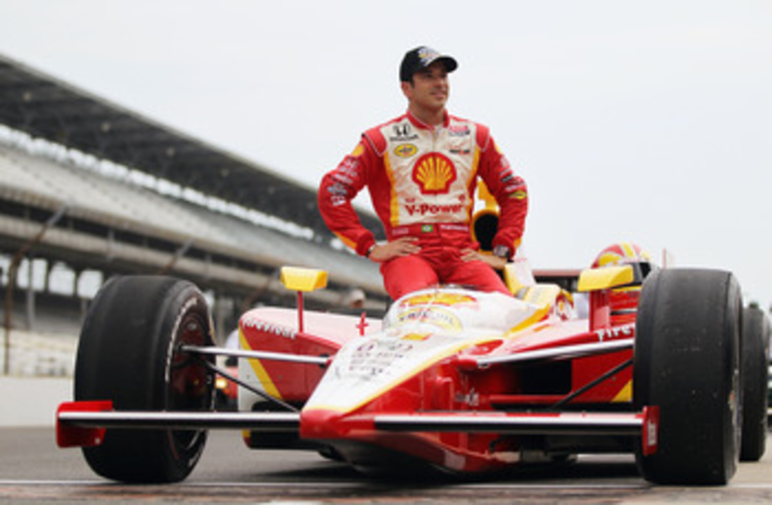 INDIANAPOLIS, IN - MAY 21: Helio Castroneves of Brazil, driver of the Shell V-Power/Penzoil Ultra Team Penske Dallara Honda, poses for an official portrait during qualifying for the Indianapolis 500 on May 21, 2011 at Indianapolis Motor Speedway in India INDIANAPOLIS, IN - MAY 21: Helio Castroneves of Brazil, driver of the Shell V-Power/Penzoil Ultra Team Penske Dallara Honda, poses for an official portrait during qualifying for the Indianapolis 500 on May 21, 2011 at Indianapolis Motor Speedway in India