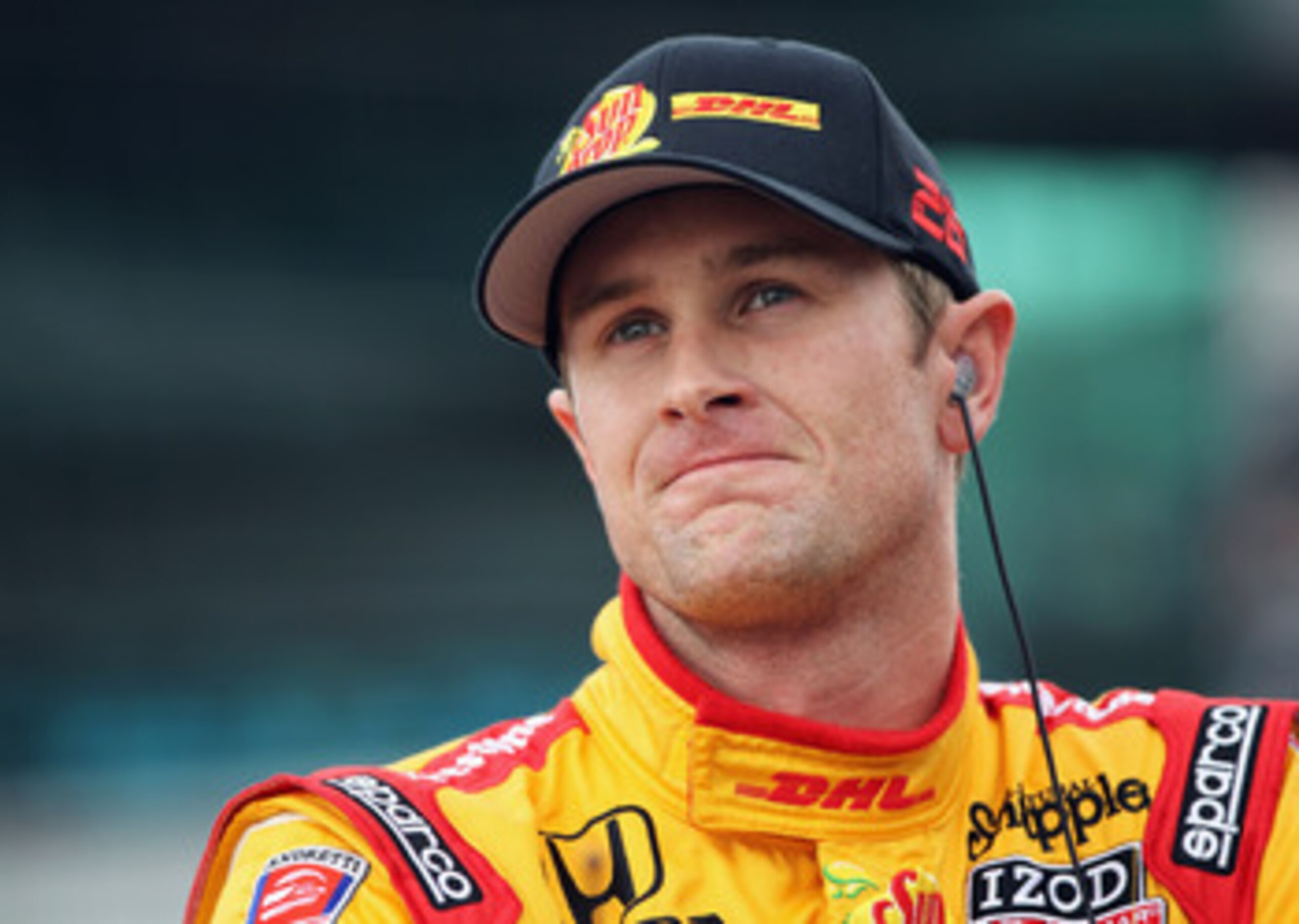 INDIANAPOLIS, IN - MAY 22: Ryan Hunter-Reay, driver of the #26 Team DHL/Sun Drop Citrus Soda Dallara Honda, watches the scoreboard as he waits to qualify for the Indianapolis 500 on May 22, 2011 at Indianapolis Motor Speedway in Indianapolis, Indiana. ( INDIANAPOLIS, IN - MAY 22: Ryan Hunter-Reay, driver of the #26 Team DHL/Sun Drop Citrus Soda Dallara Honda, watches the scoreboard as he waits to qualify for the Indianapolis 500 on May 22, 2011 at Indianapolis Motor Speedway in Indianapolis, Indiana. (
