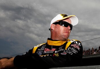 INDIANAPOLI, IN - MAY 22: Paul Tracy, driver of the #23 Wix Filters Dreyer & Reinbold Racing Dallara Honda, waits to drive  during qualifying for the the 95th Indianapolis 500 Mile Race at the Indianapolis Motor Speedway on May 22, 2011 in Indianapolis, I