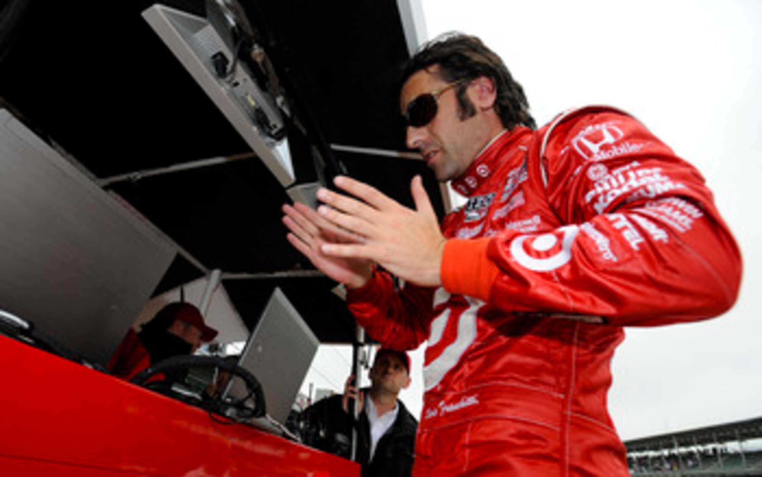 INDIANAPOLIS, IN - MAY 27: Dario Franchitti of Scotland, driver of the #10 Target Chip Ganassi Racing Dallara Honda, prepares for the final practice on Carb Day for the 95th running of the Indianapolis 500 on May 27, 2011 at the Indianapolis Motor Speedw INDIANAPOLIS, IN - MAY 27: Dario Franchitti of Scotland, driver of the #10 Target Chip Ganassi Racing Dallara Honda, prepares for the final practice on Carb Day for the 95th running of the Indianapolis 500 on May 27, 2011 at the Indianapolis Motor Speedw