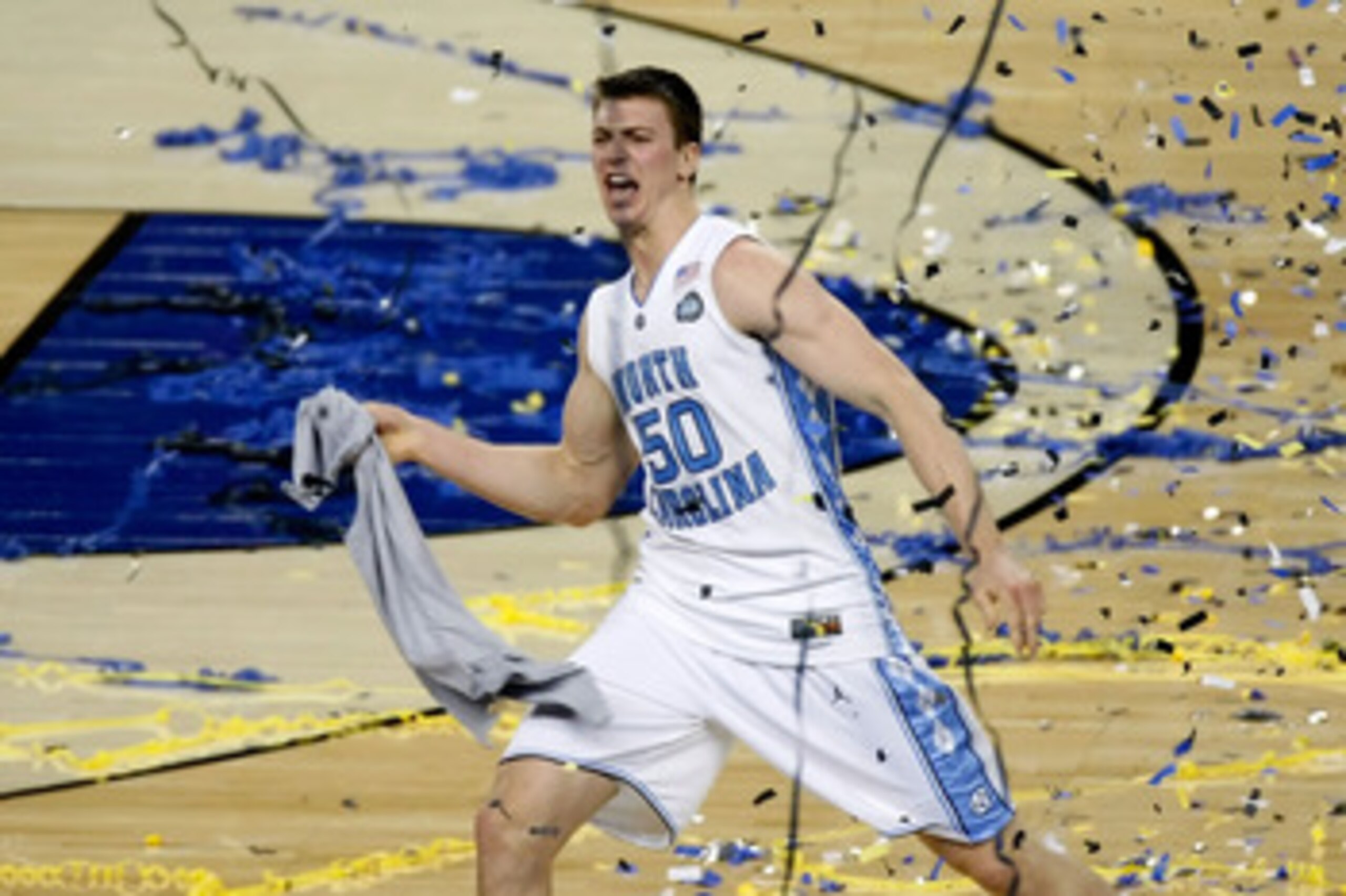 DETROIT - APRIL 06:  Tyler Hansbrough #50 of the North Carolina Tar Heels celebrates with his teammates after they won 89-72 against the Michigan State Spartans during the 2009 NCAA Division I Men's Basketball National Championship game at Ford Field on A