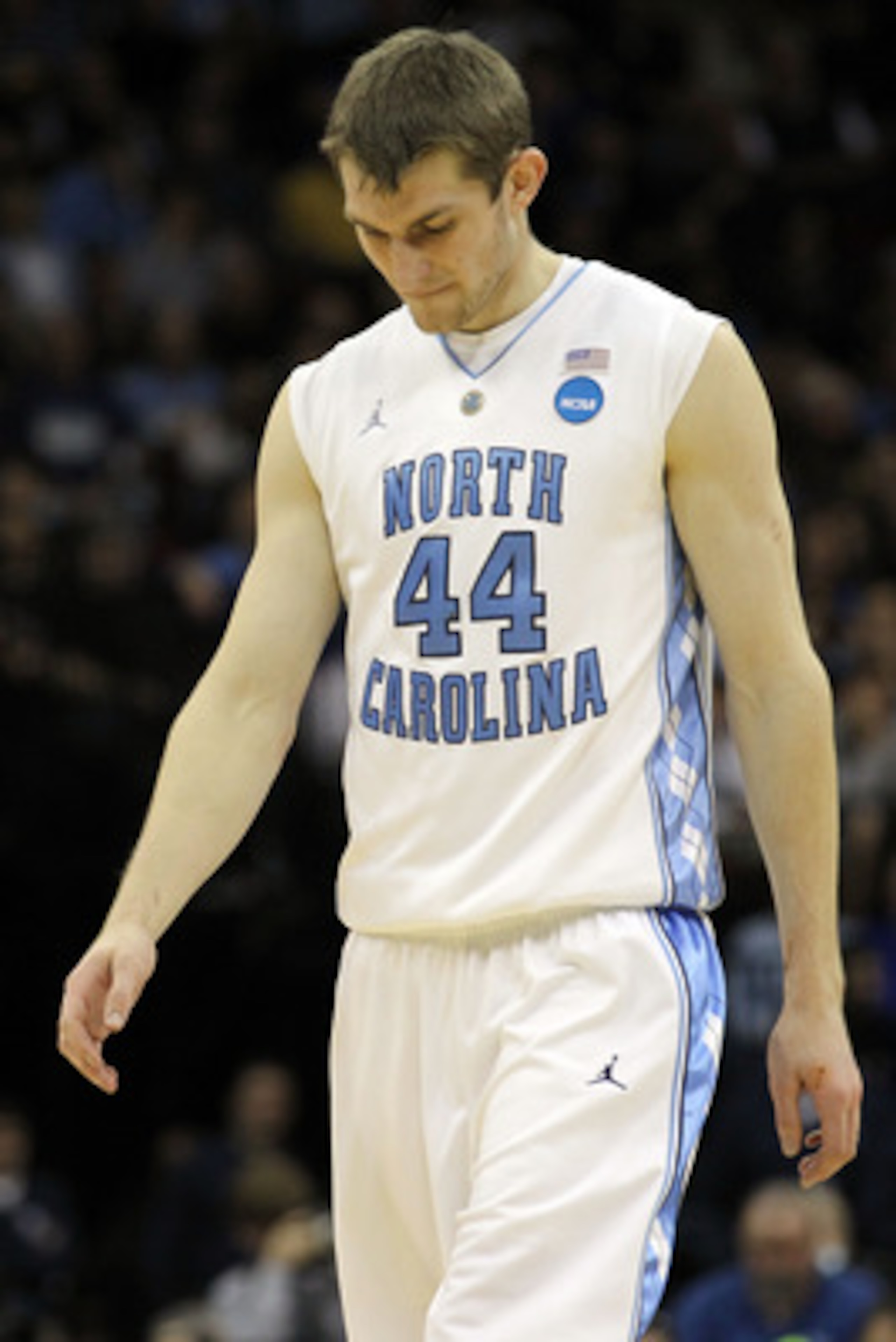 NEWARK, NJ - MARCH 27: Tyler Zeller #44 of the North Carolina Tar Heels walks on court during the first half of the game against the Kentucky Wildcats in the east regional final of the 2011 NCAA men's basketball tournament at Prudential Center on March 2 NEWARK, NJ - MARCH 27: Tyler Zeller #44 of the North Carolina Tar Heels walks on court during the first half of the game against the Kentucky Wildcats in the east regional final of the 2011 NCAA men's basketball tournament at Prudential Center on March 2