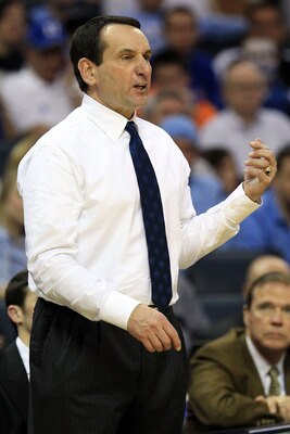 CHARLOTTE, NC - MARCH 20:  Head coach Mike Krzyzewski of the Duke Blue Devils reacts while taking on the Michigan Wolverines during the third round of the 2011 NCAA men's basketball tournament at Time Warner Cable Arena on March 20, 2011 in Charlotte, Nor